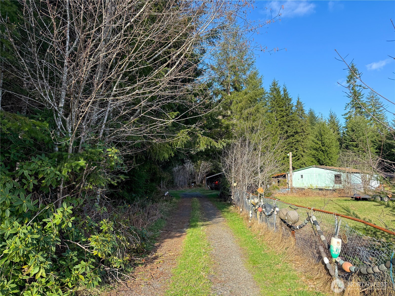 3190 East Hoquiam Road Hoquiam, WA 98550 - Photo 4 of 18 a view of a lake with houses