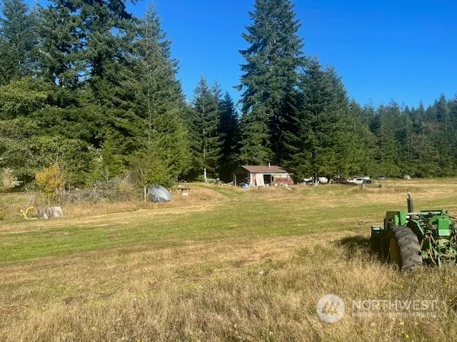 a view of an ocean and a mountain
