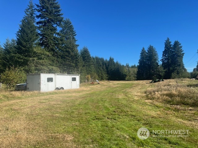 3190 East Hoquiam Road Hoquiam, WA 98550 - Photo 9 of 28 a view of a large tree with a yard