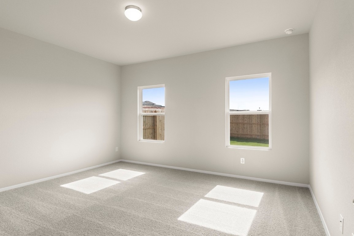 5409 Murano Cove Austin, TX 78747 - Photo 22 of 32 an empty room with windows