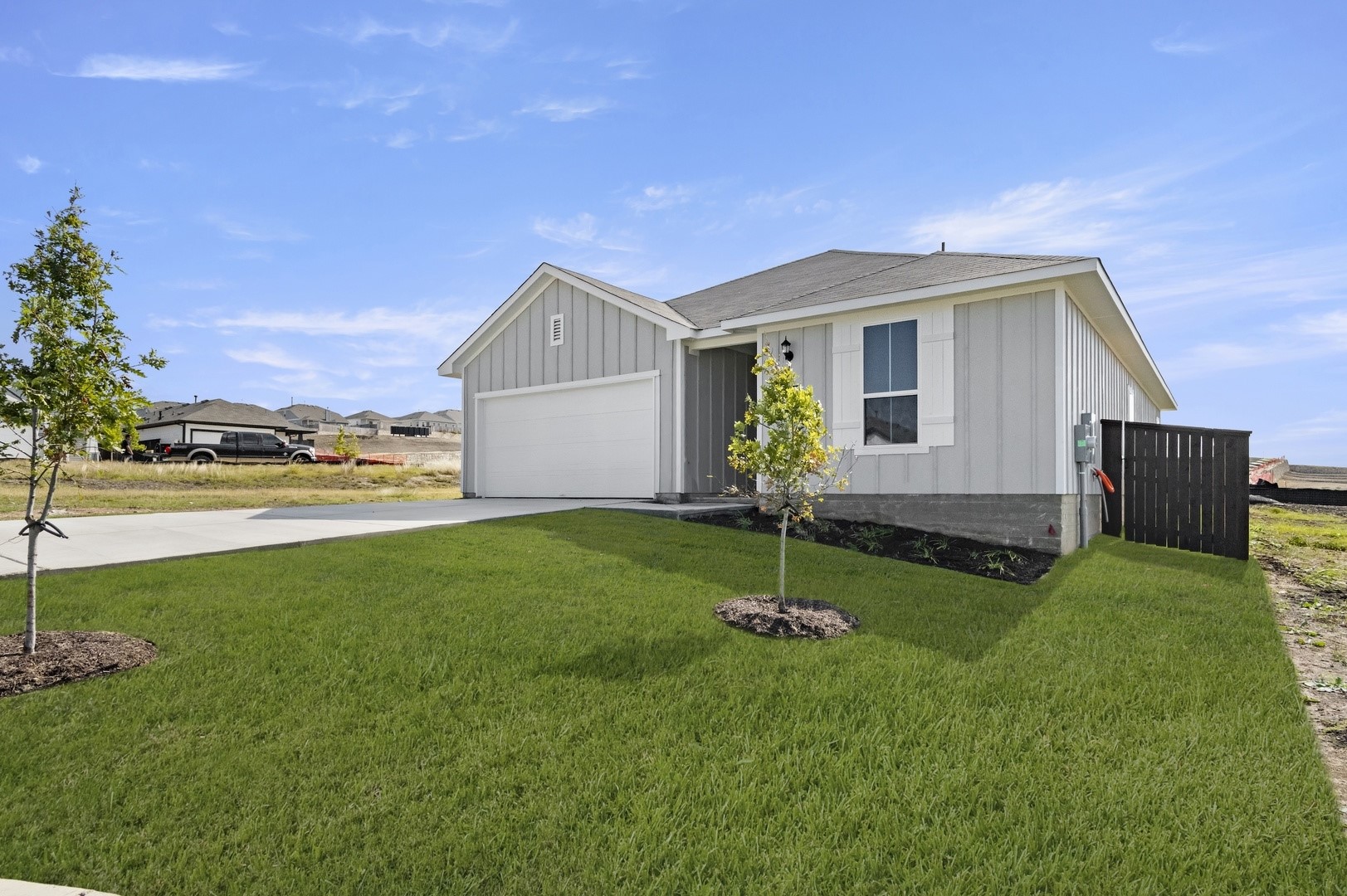5409 Murano Cove Austin, TX 78747 - Photo 3 of 32 a front view of house with a garden and deck