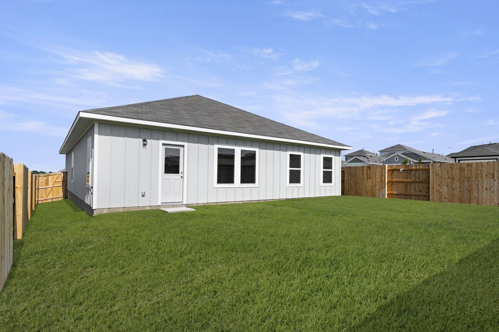 5409 Murano Cove Austin, TX 78747 - Photo 32 of 32 a view of a yard in front of a house with large trees