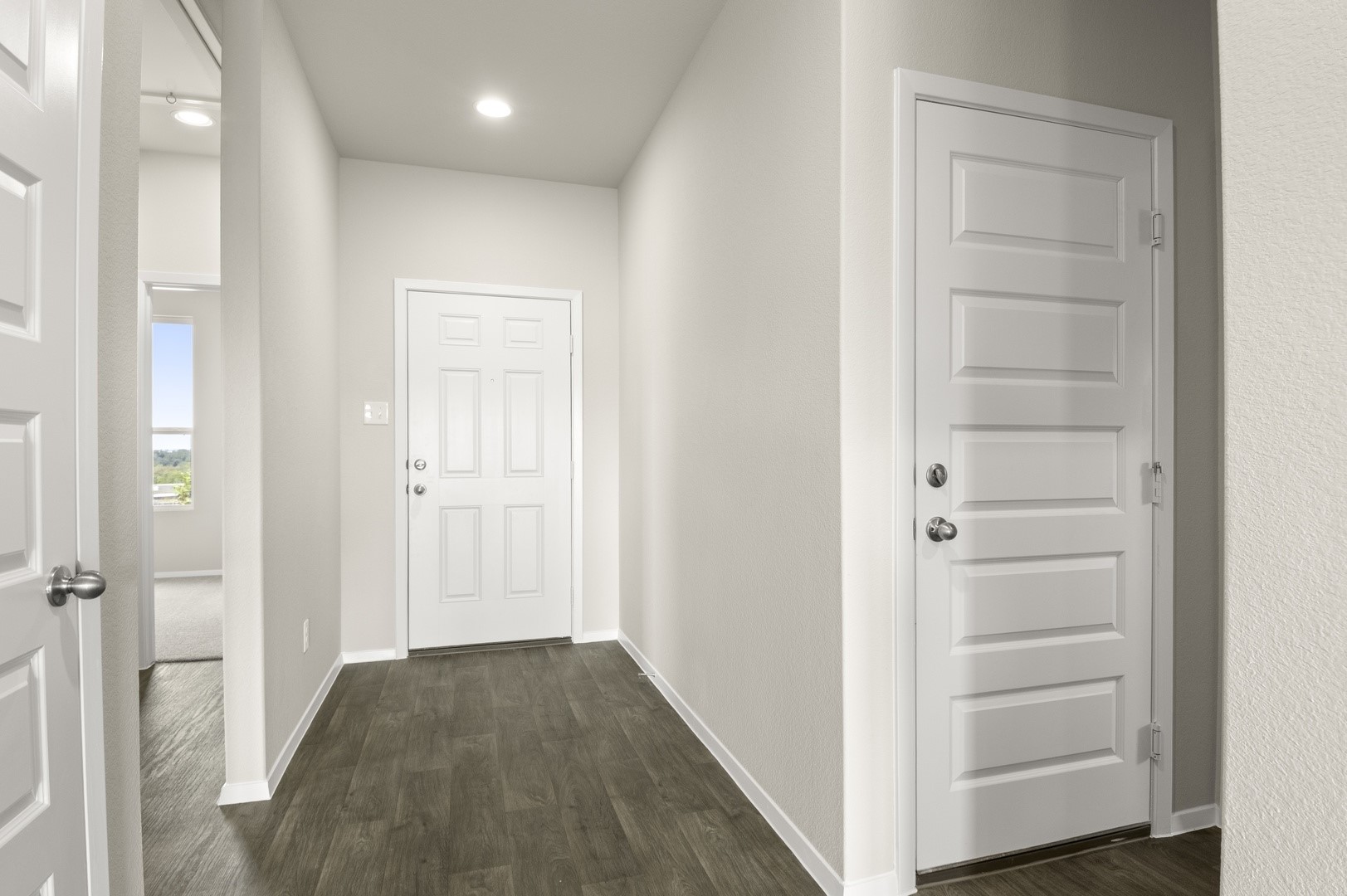 5409 Murano Cove Austin, TX 78747 - Photo 6 of 32 a view of a hallway with wooden floor