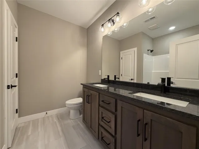 $575,000 | 1136 Southwest Whitby Drive, Lee's Summit, MO 64083