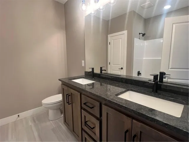 $595,000 | 1136 Southwest Whitby Drive, Lee's Summit, MO 64083