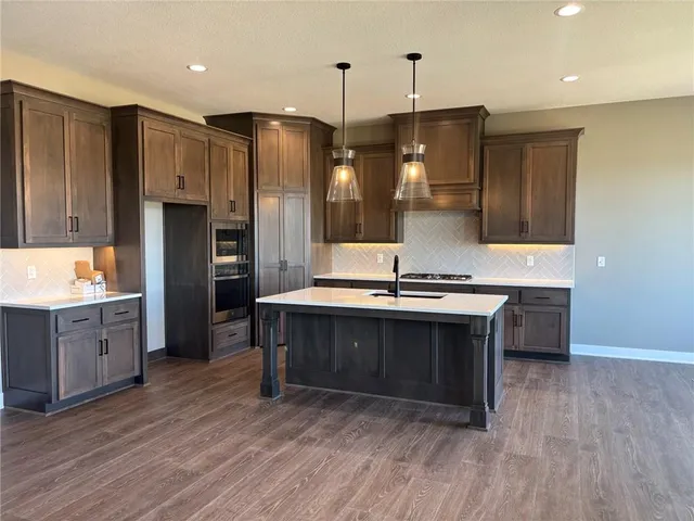 $595,000 | 1136 Southwest Whitby Drive, Lee's Summit, MO 64083