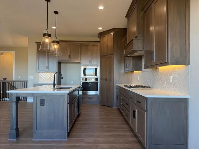 $575,000 | 1136 Southwest Whitby Drive, Lee's Summit, MO 64083