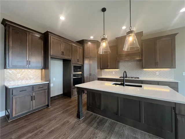 $595,000 | 1136 Southwest Whitby Drive, Lee's Summit, MO 64083