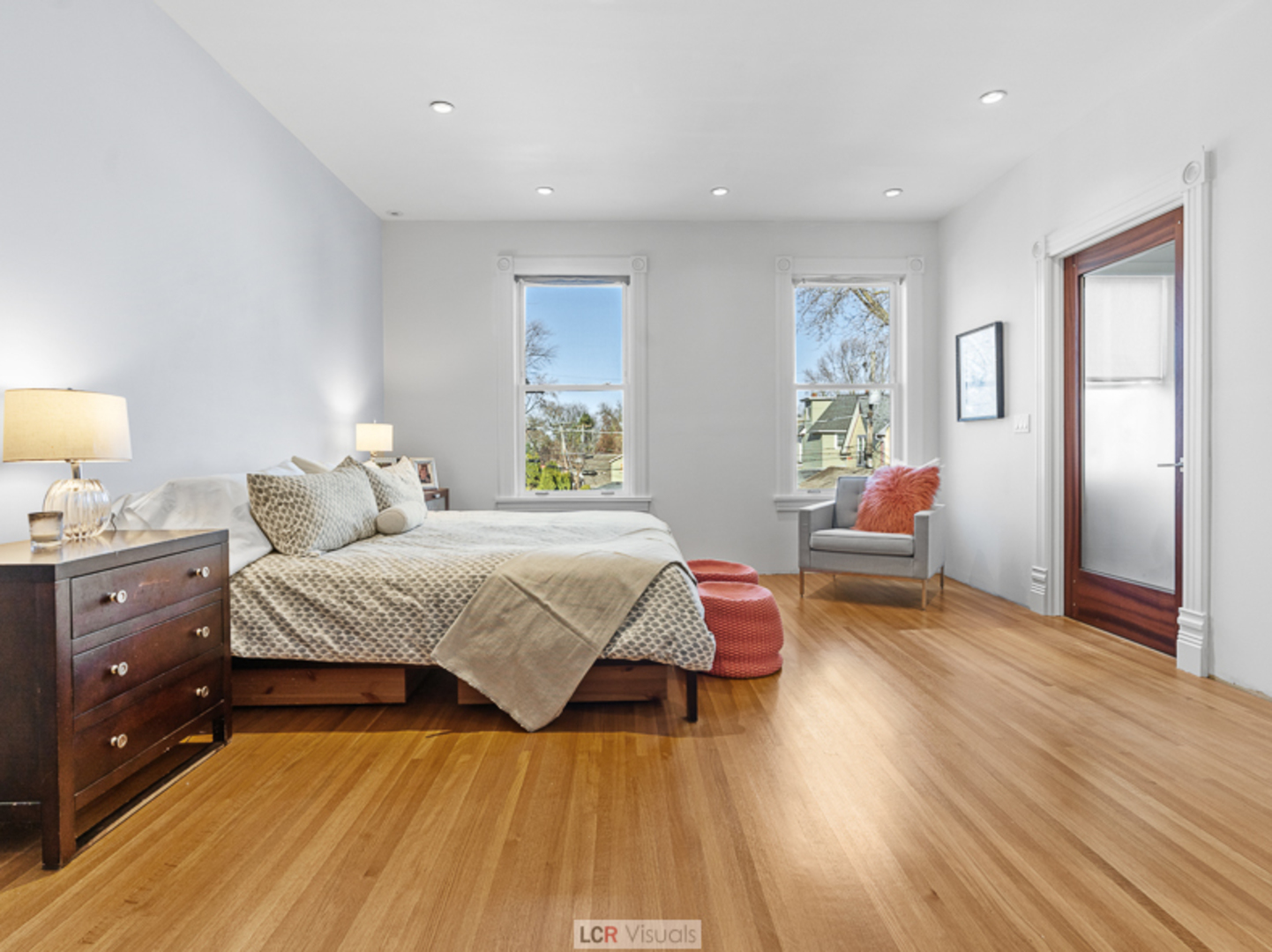 1012 Chicago Avenue Oak Park, IL 60302 - Photo 13 of 27 a spacious bedroom with a bed and wooden floor