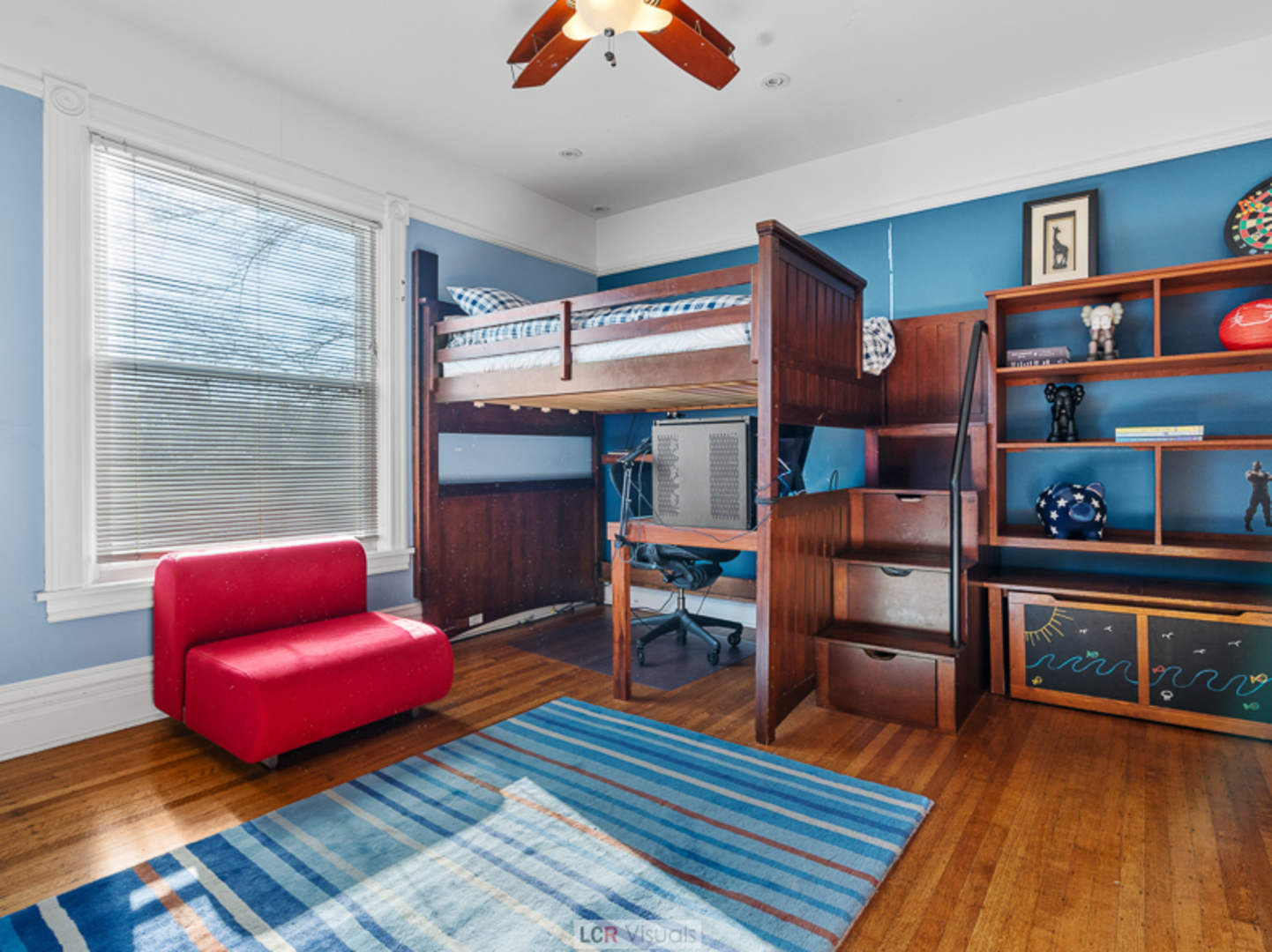 1012 Chicago Avenue Oak Park, IL 60302 - Photo 16 of 27 a living room with furniture a rug and a window