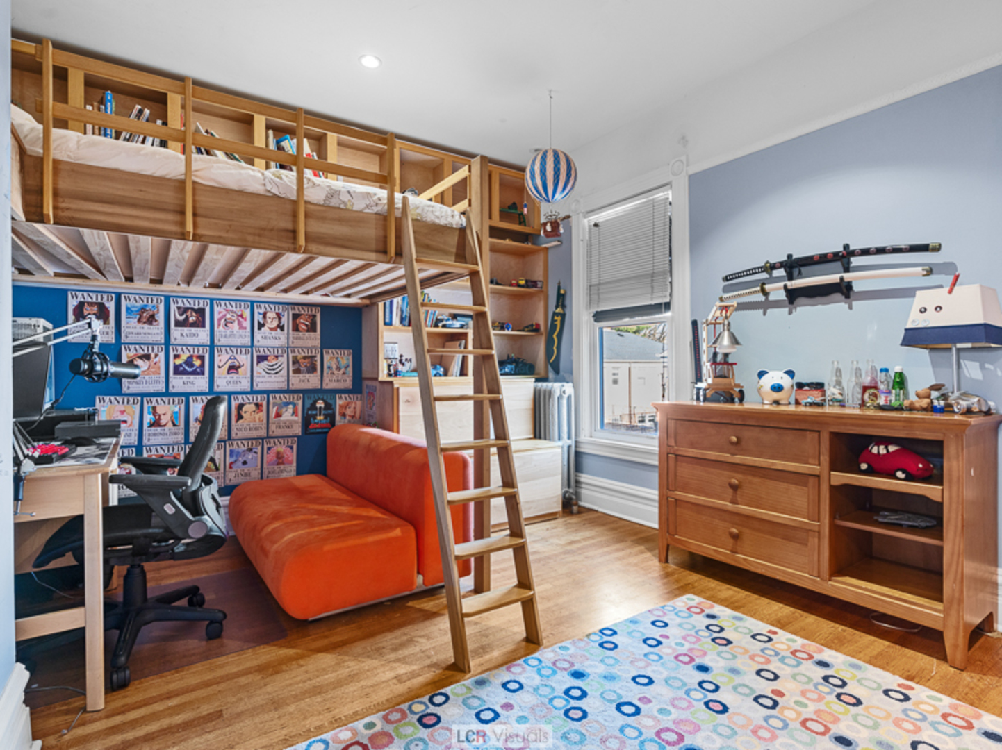 1012 Chicago Avenue Oak Park, IL 60302 - Photo 17 of 27 a bedroom with furniture and a book shelf