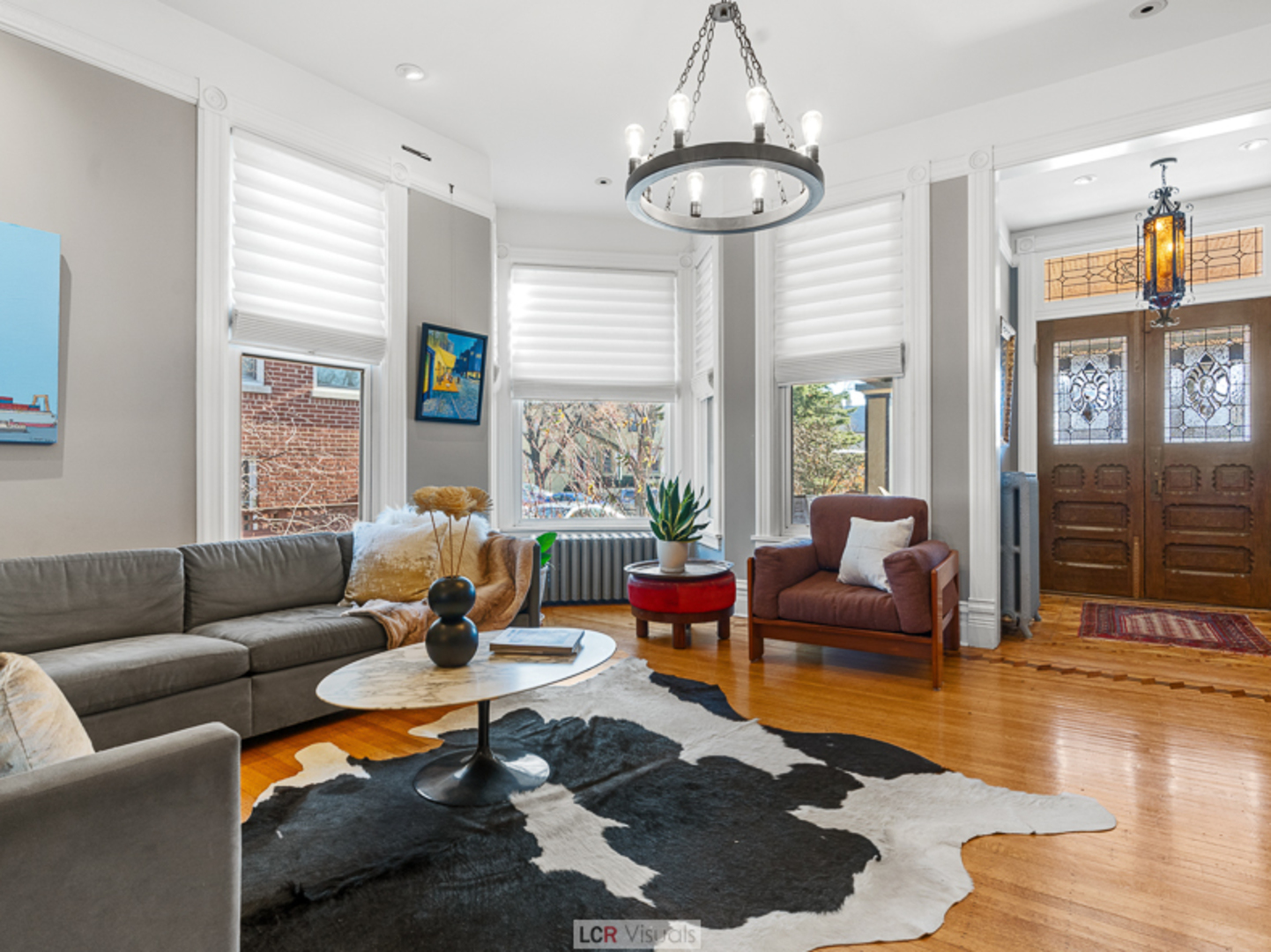 1012 Chicago Avenue Oak Park, IL 60302 - Photo 2 of 27 a living room with furniture or couch and a large window