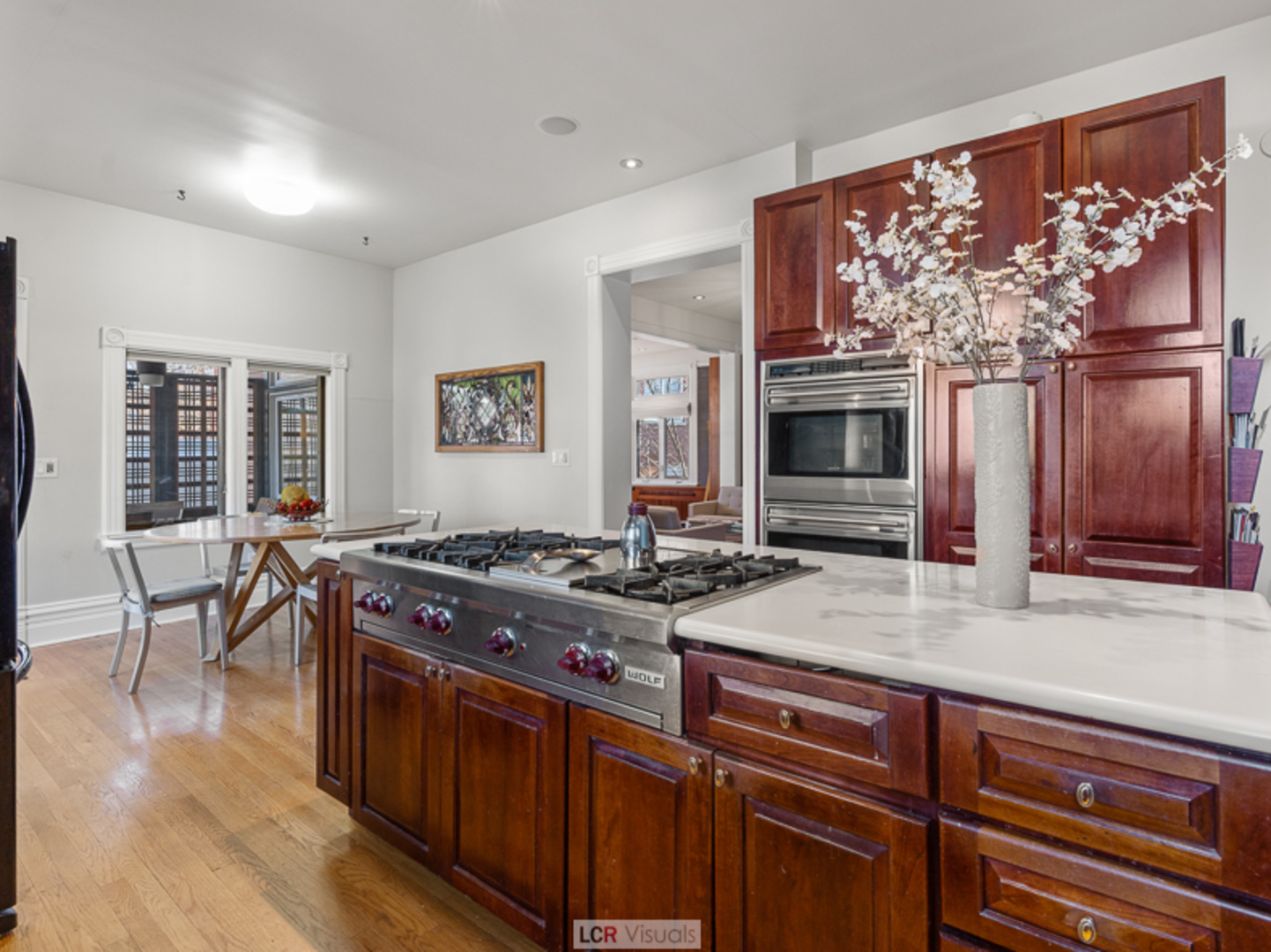1012 Chicago Avenue Oak Park, IL 60302 - Photo 7 of 27 a kitchen with stainless steel appliances granite countertop a stove and a sink