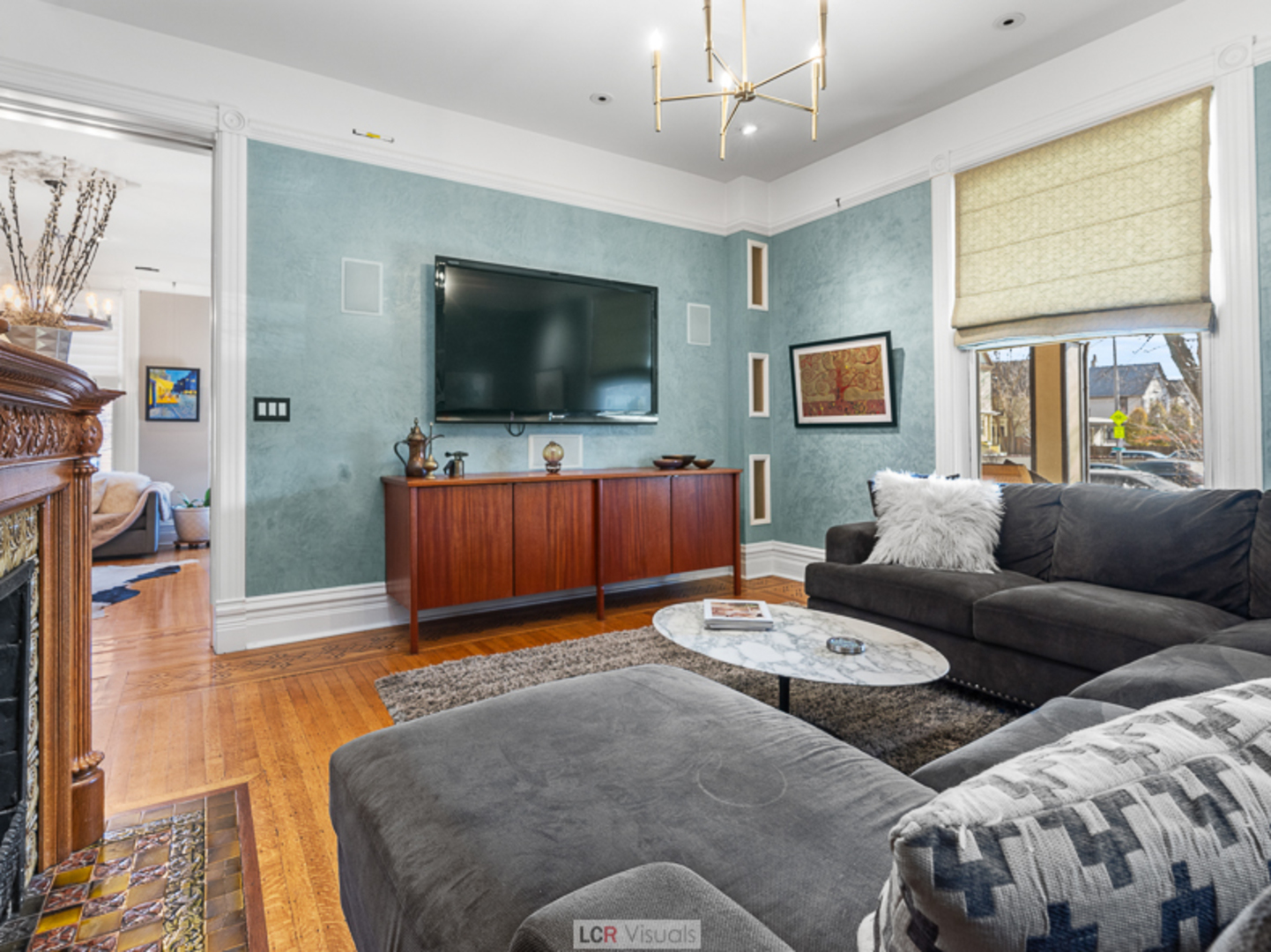 1012 Chicago Avenue Oak Park, IL 60302 - Photo 10 of 27 a living room with furniture and a flat screen tv