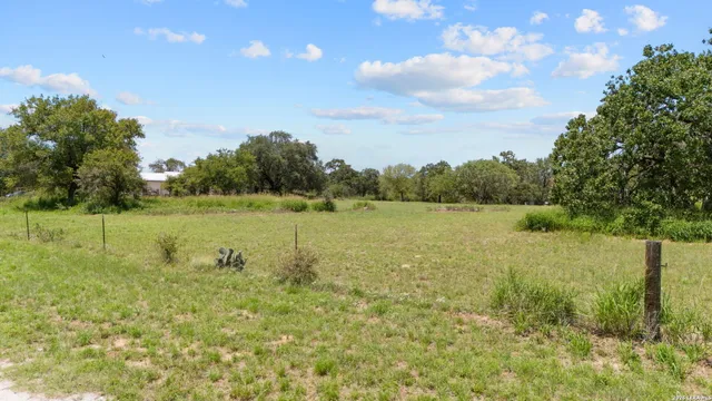 a view of a lake from a yard