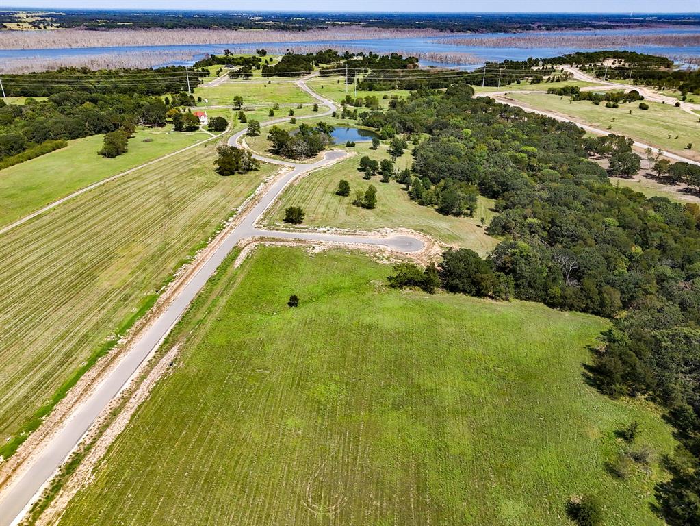 220 Diamond Point Dodd City, TX 75438 - Photo 19 of 36 Aerial view of property and surrounding area featuring a large body of water