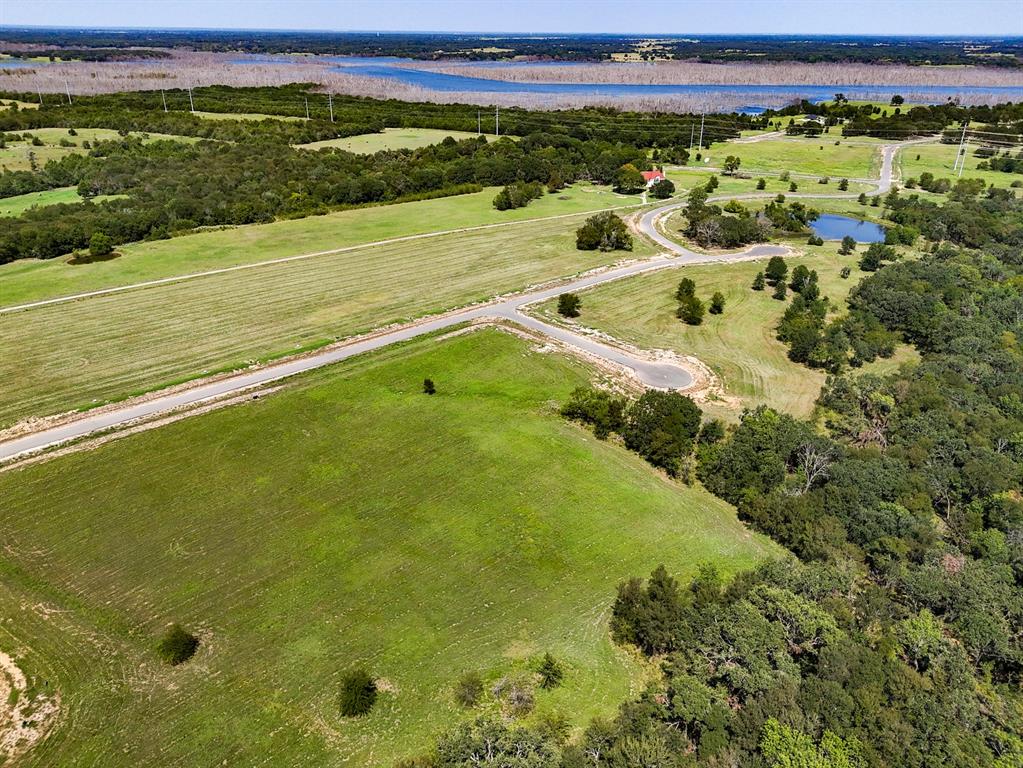 220 Diamond Point Dodd City, TX 75438 - Photo 24 of 36 Drone / aerial view of a nearby body of water