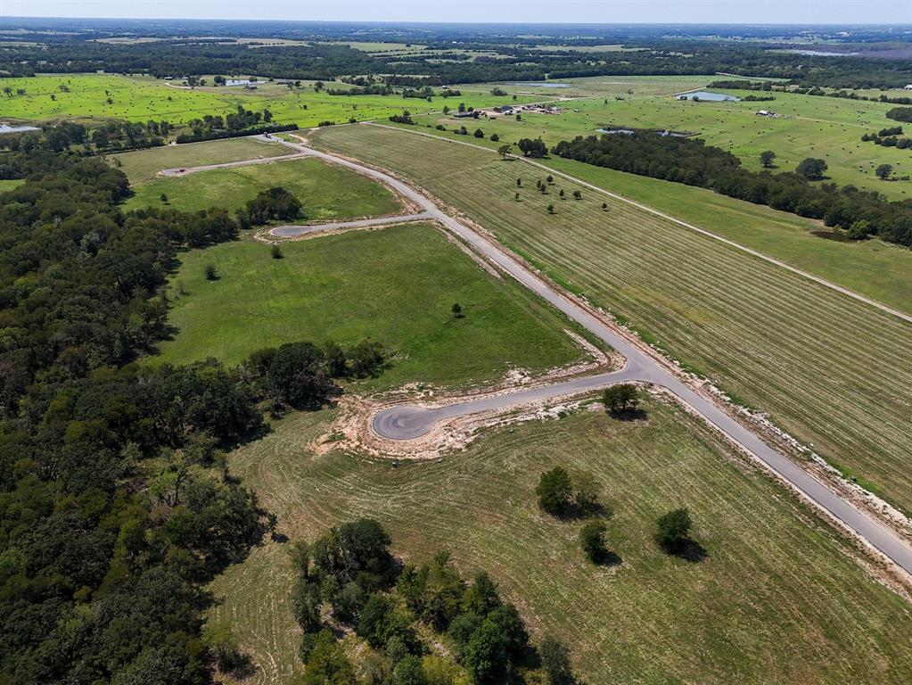 220 Diamond Point Dodd City, TX 75438 - Photo 29 of 36 Aerial view of property and surrounding area featuring rural landscape