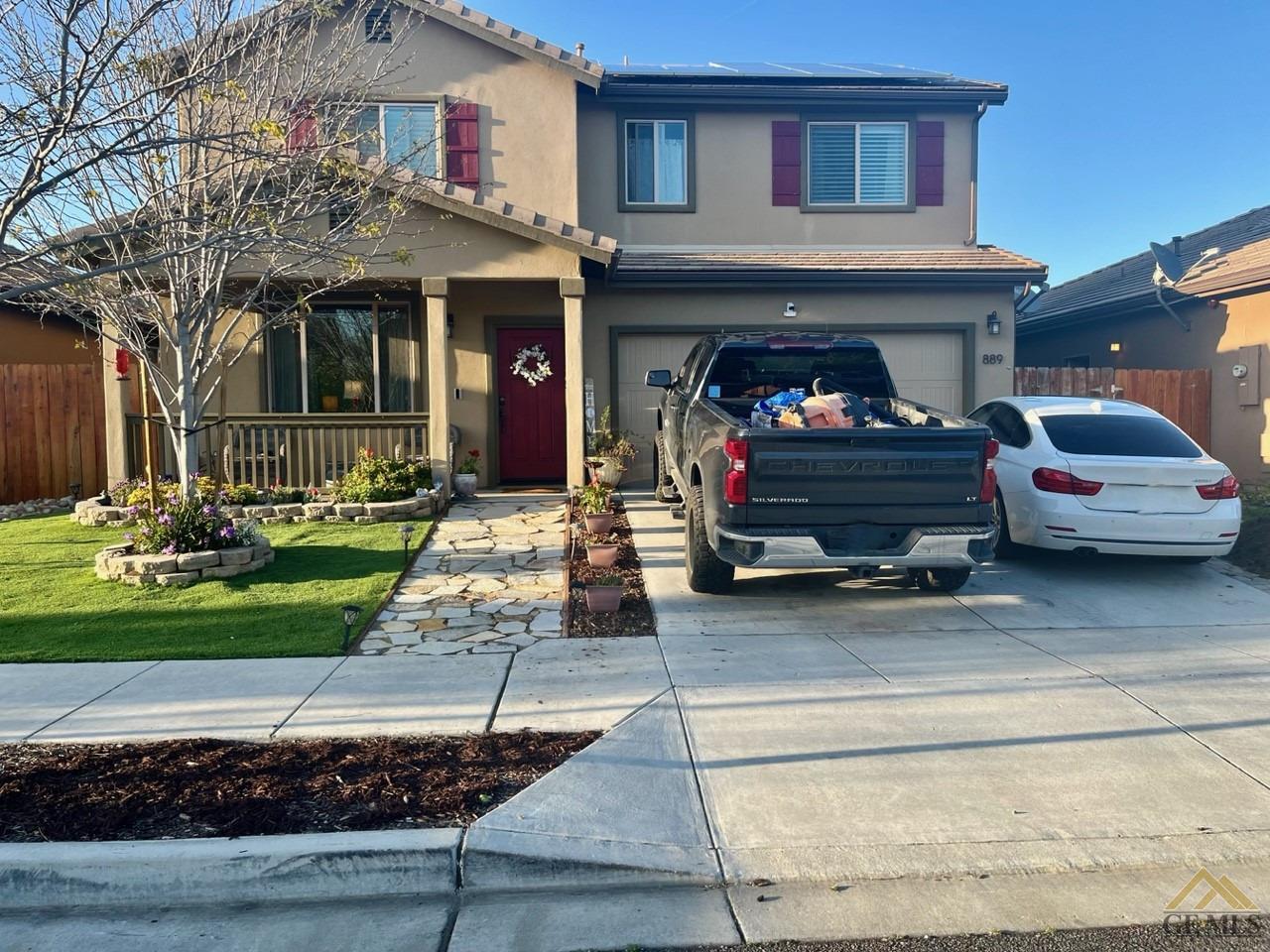 Undisclosed Address San Miguel, CA 93451 - Photo 1 of 12 a front view of a house with a yard