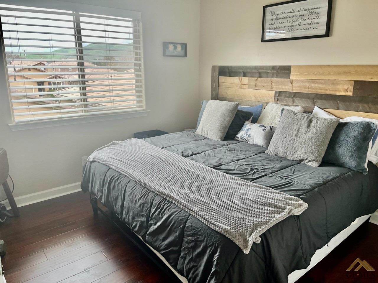 Undisclosed Address San Miguel, CA 93451 - Photo 8 of 12 a bed sitting in a bedroom next to a window