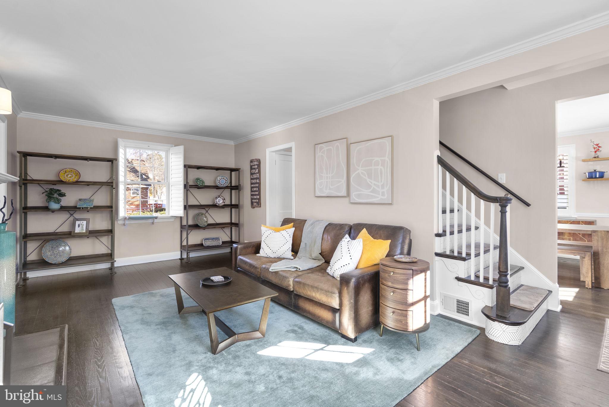 707 Forest Glen Road Silver Spring, MD 20901 - Photo 12 of 48 a living room with furniture and a wooden floor