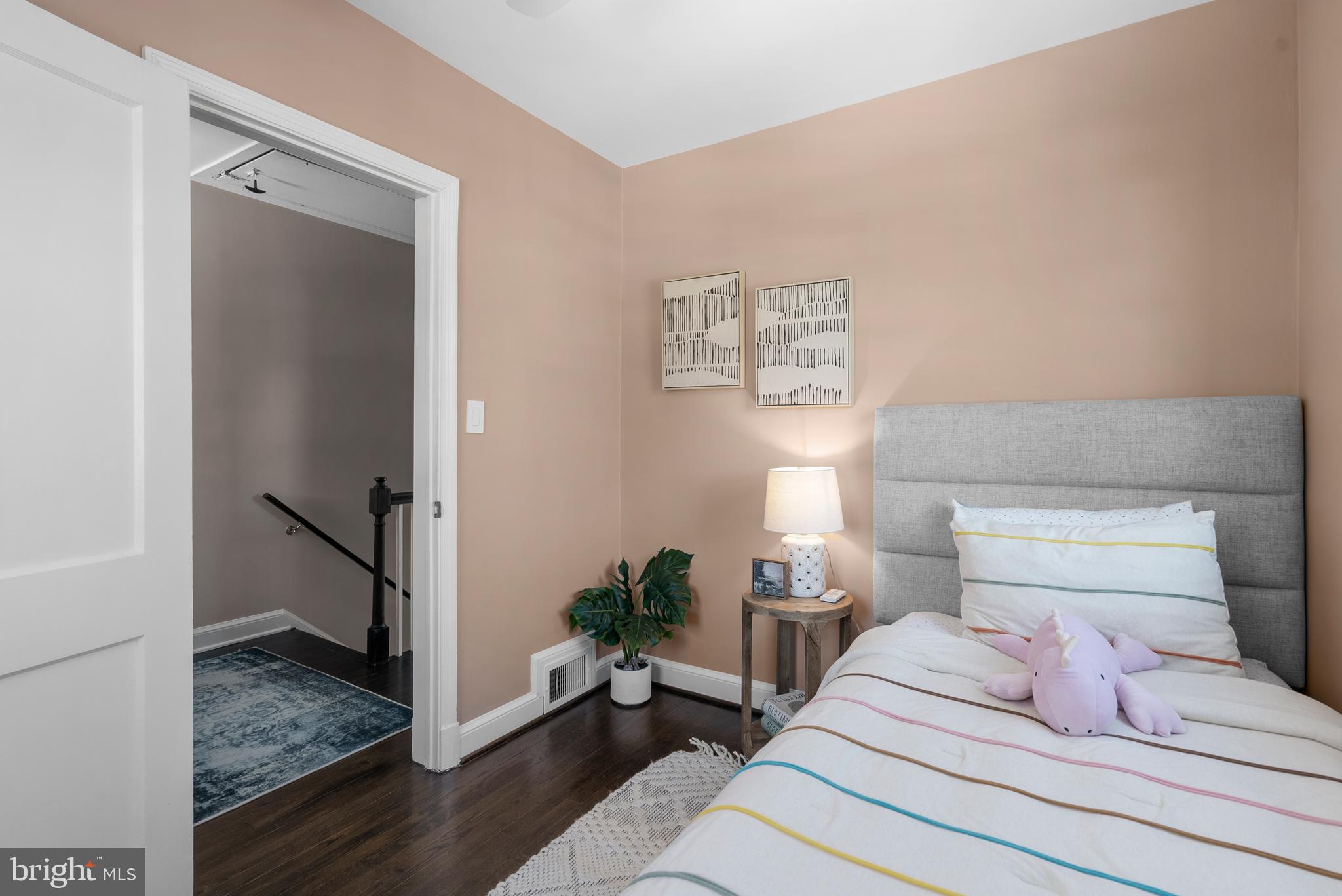 707 Forest Glen Road Silver Spring, MD 20901 - Photo 25 of 48 a bedroom with a bed and a window