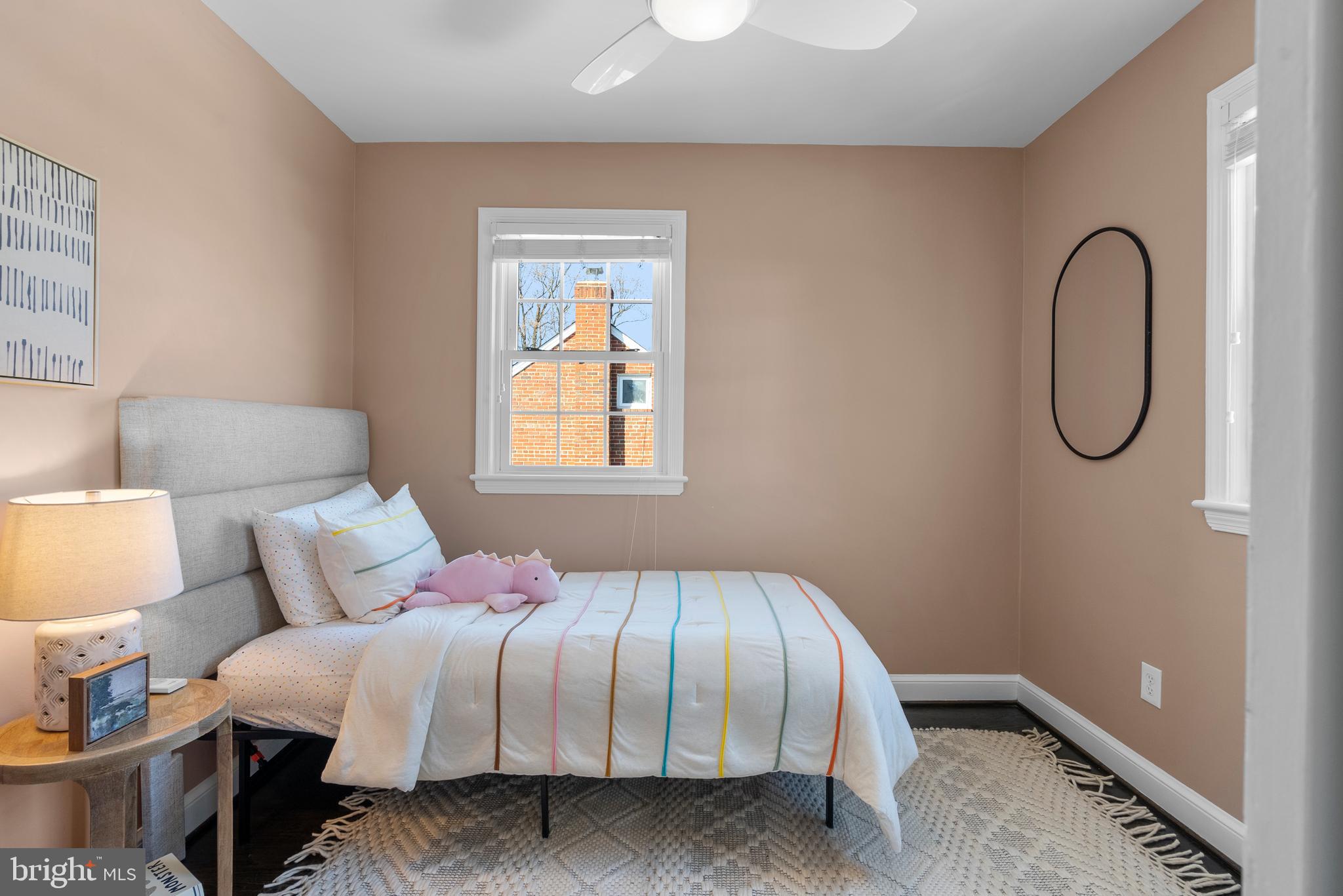 707 Forest Glen Road Silver Spring, MD 20901 - Photo 26 of 48 a bedroom with bed and a window
