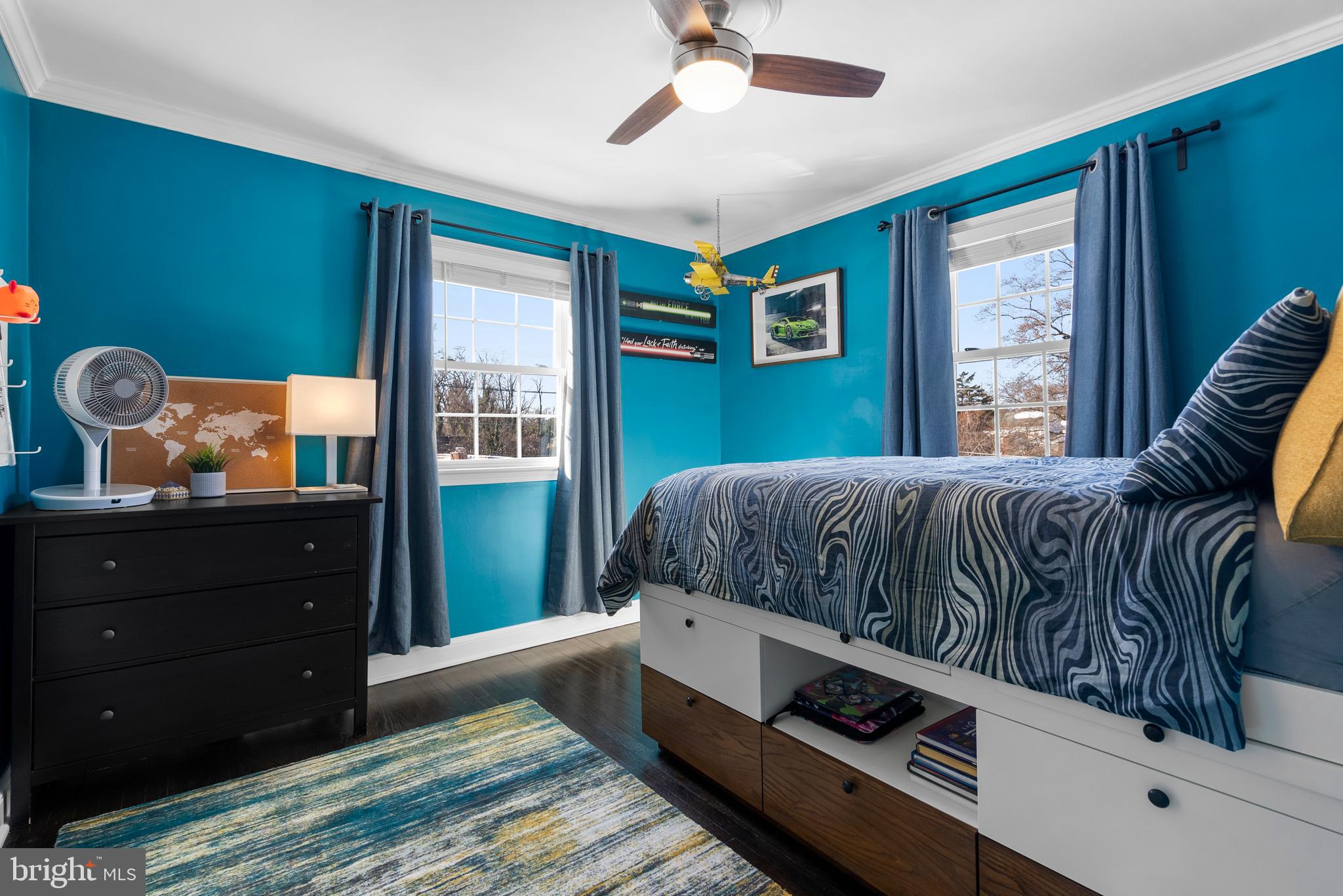 707 Forest Glen Road Silver Spring, MD 20901 - Photo 28 of 48 a living room with a bed and a window