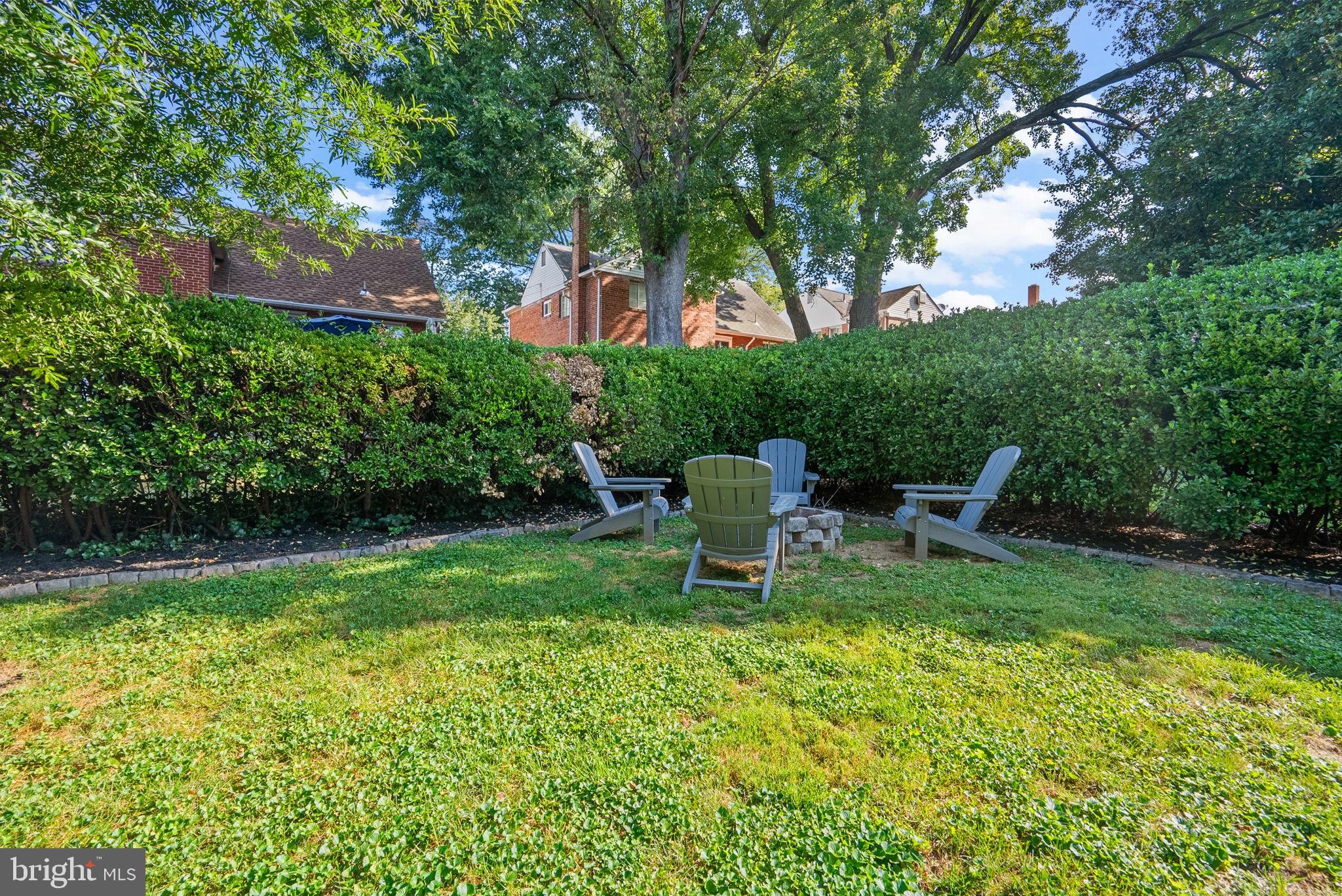 707 Forest Glen Road Silver Spring, MD 20901 - Photo 41 of 48 a view of a chair and table in the garden