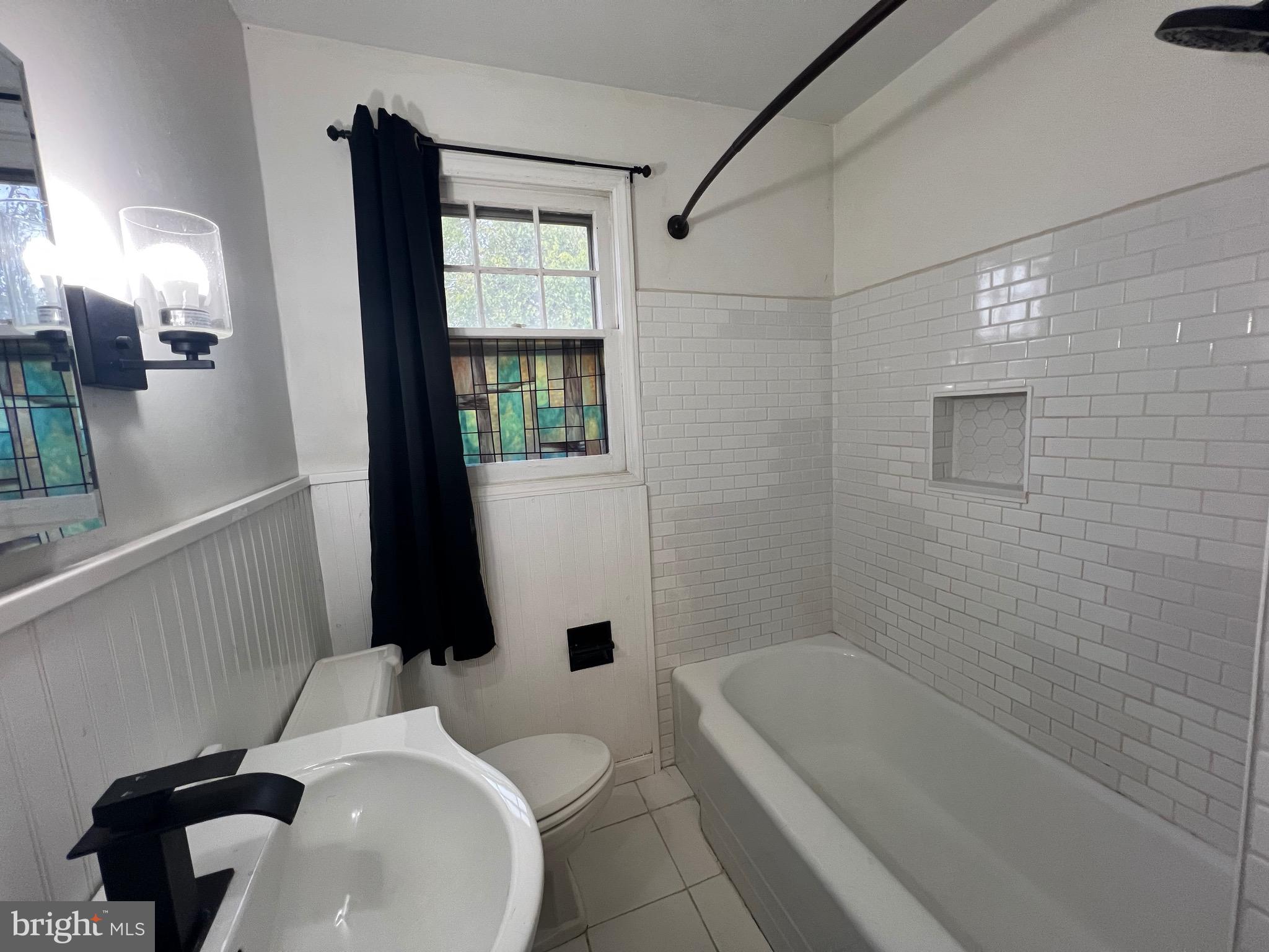 213 Nicholson Road West Collingswood Heights, NJ 08059 - Photo 11 of 18 a bathroom with a sink toilet and shower