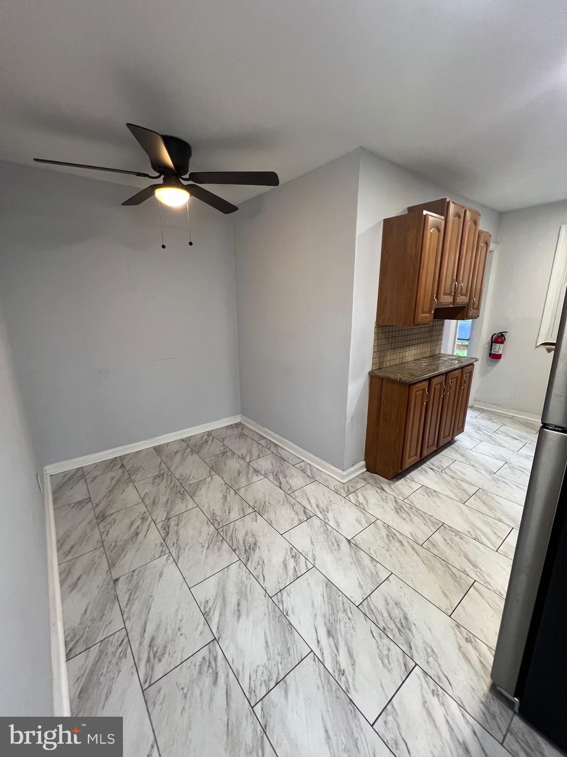 213 Nicholson Road West Collingswood Heights, NJ 08059 - Photo 4 of 18 a bedroom with a large bed and a chandelier