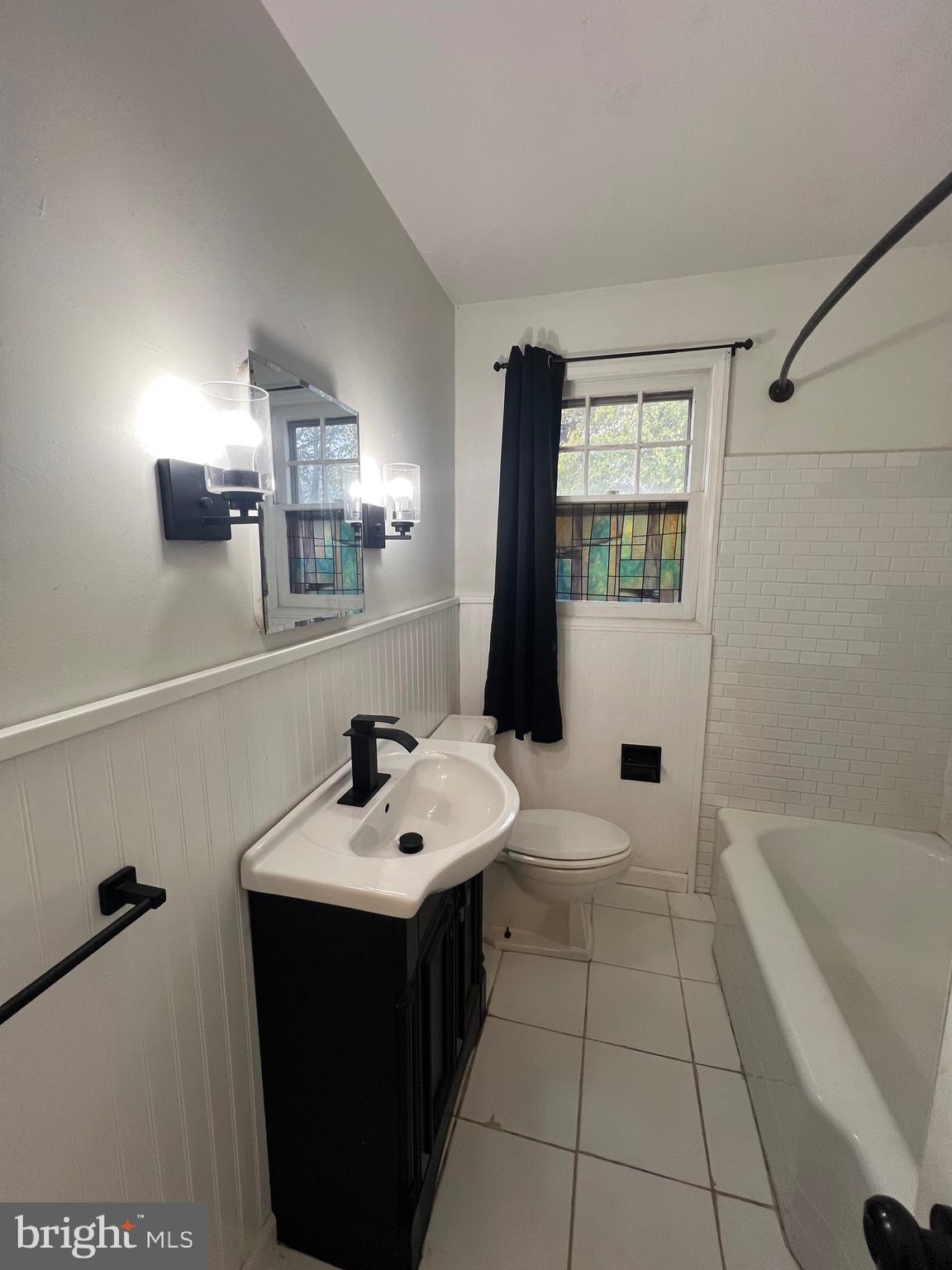 213 Nicholson Road West Collingswood Heights, NJ 08059 - Photo 10 of 18 a bathroom with a sink a toilet and bathtub