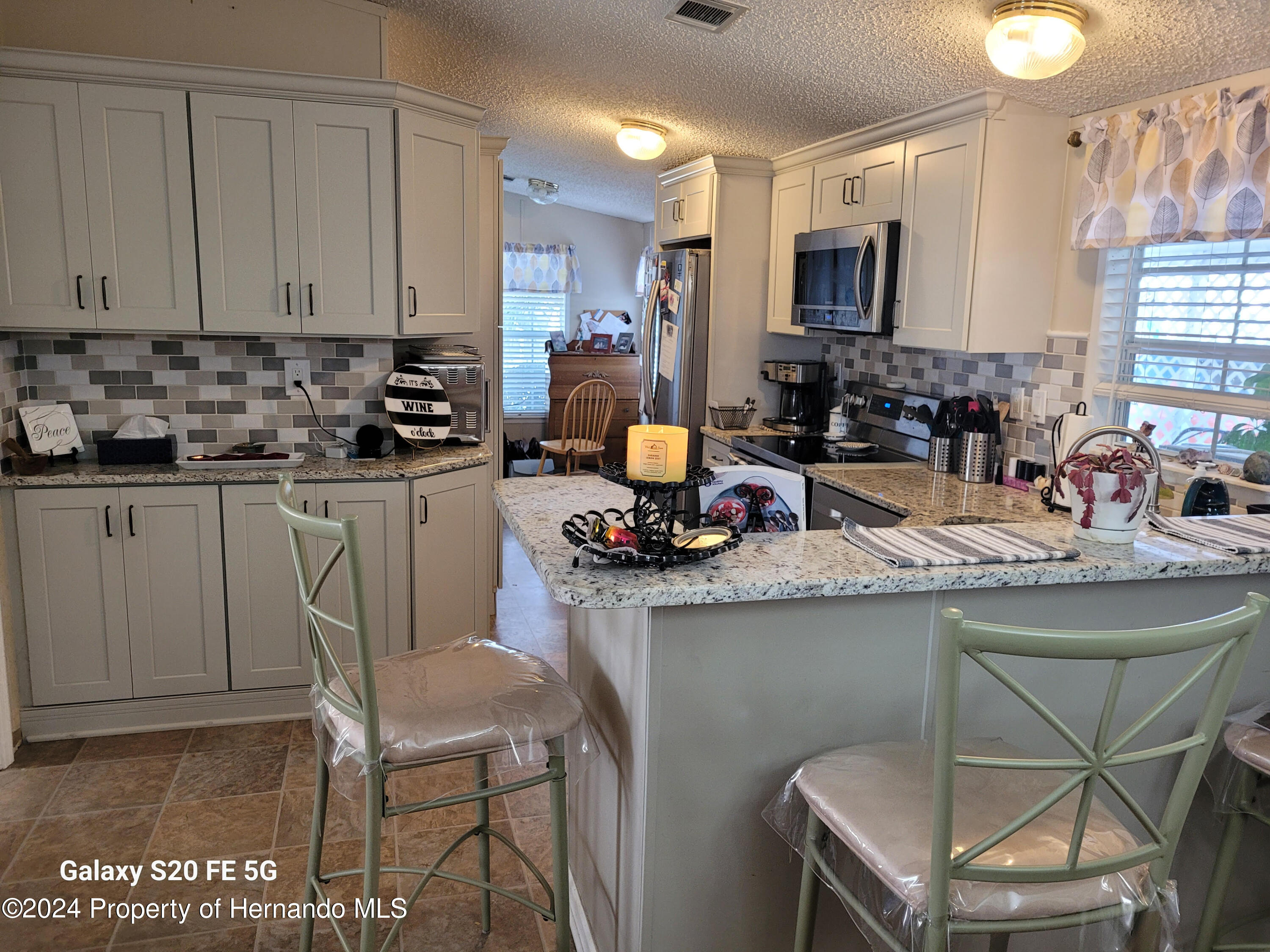 14902 Rialto Avenue Brooksville, FL 34613 - Photo 1 of 55 kitchen 5