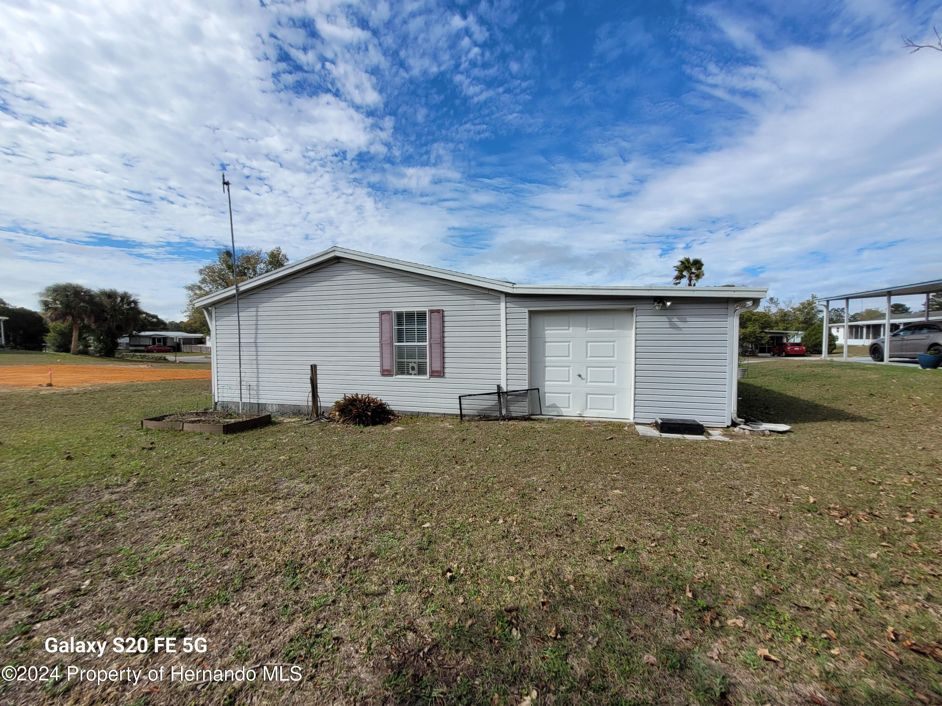 14902 Rialto Avenue Brooksville, FL 34613 - Photo 34 of 55 back of home 2