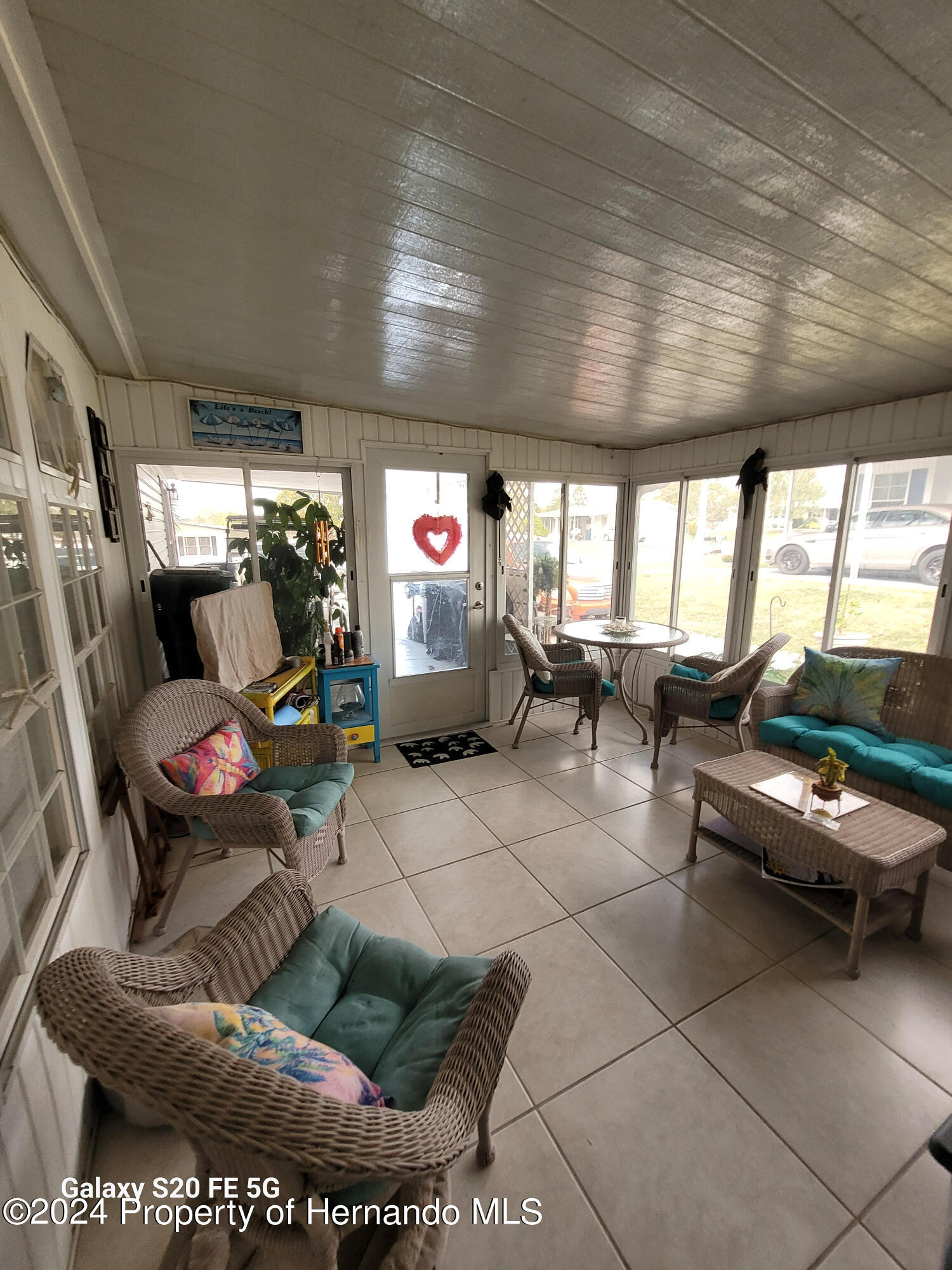 14902 Rialto Avenue Brooksville, FL 34613 - Photo 35 of 55 lanai 3