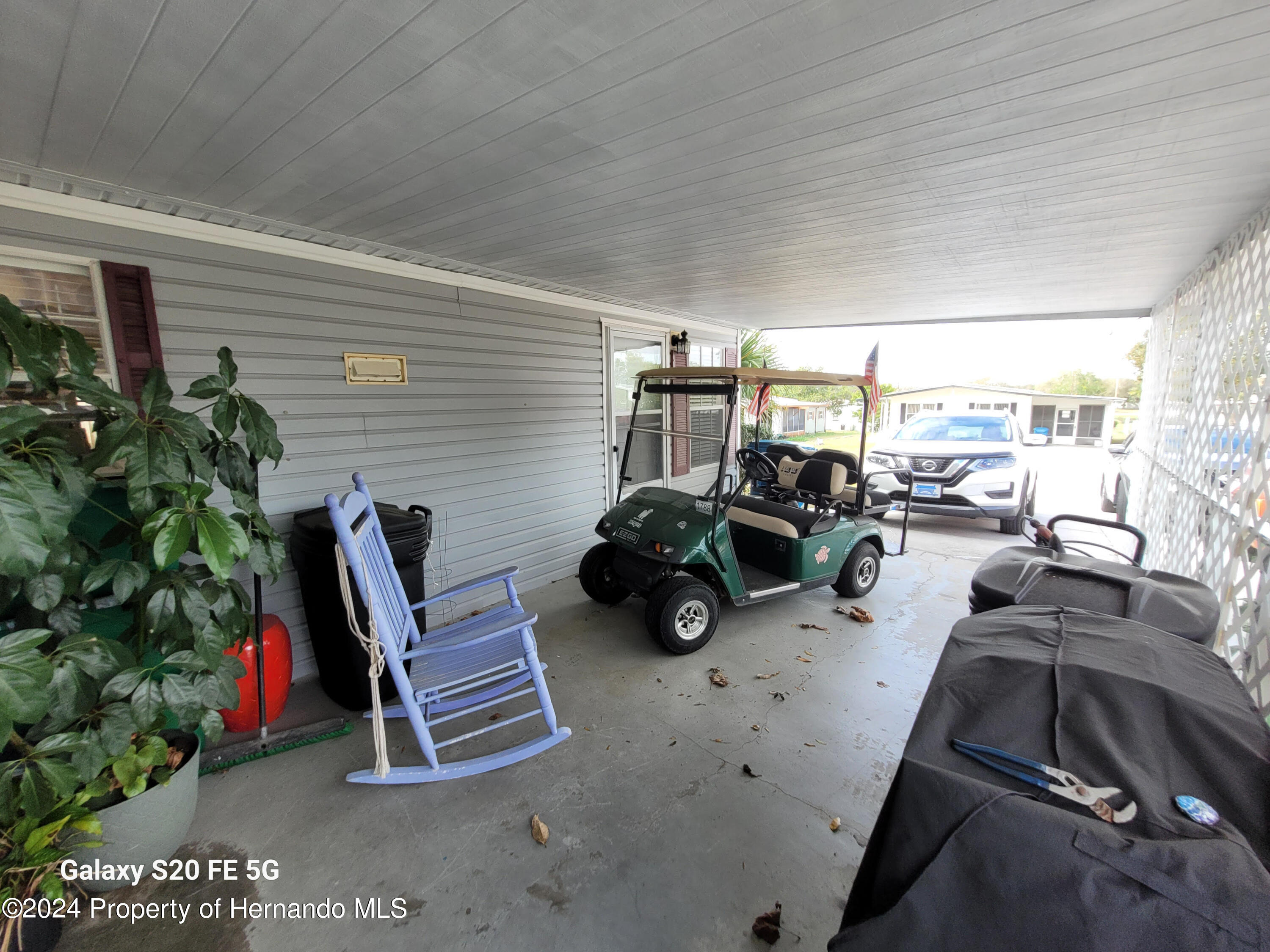 14902 Rialto Avenue Brooksville, FL 34613 - Photo 37 of 55 carport 1