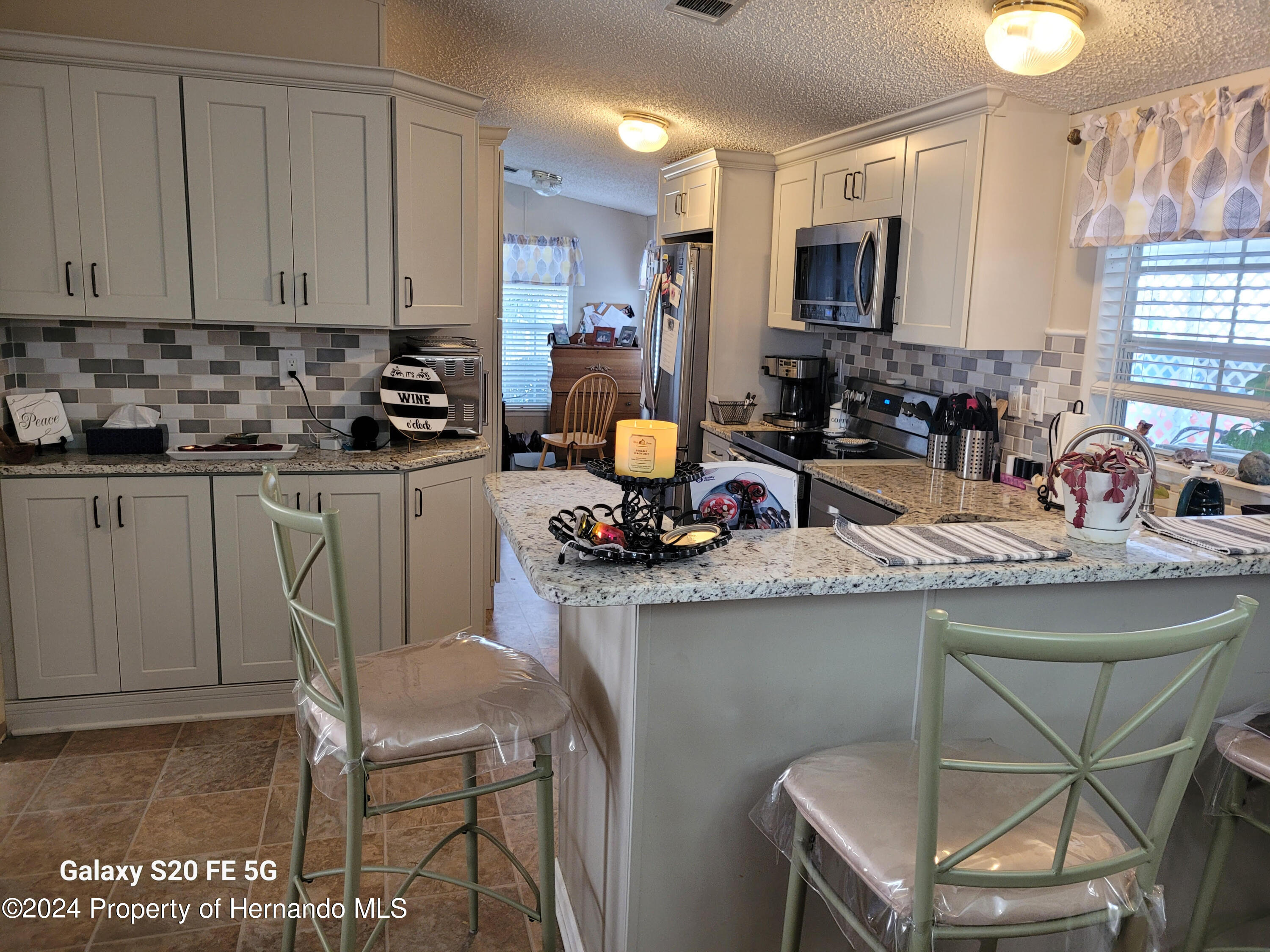 14902 Rialto Avenue Brooksville, FL 34613 - Photo 4 of 55 kitchen 6