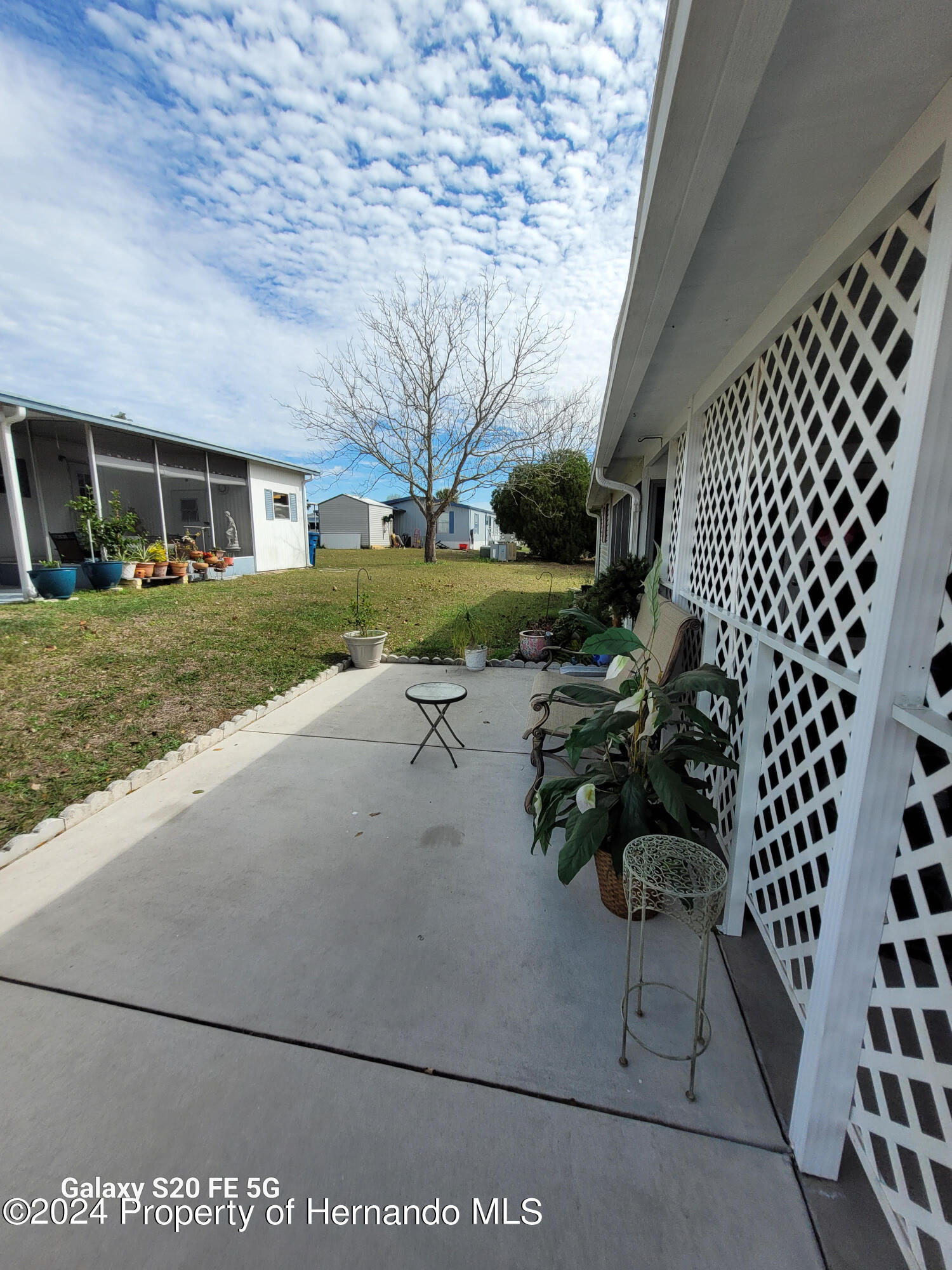 14902 Rialto Avenue Brooksville, FL 34613 - Photo 47 of 55 side porch