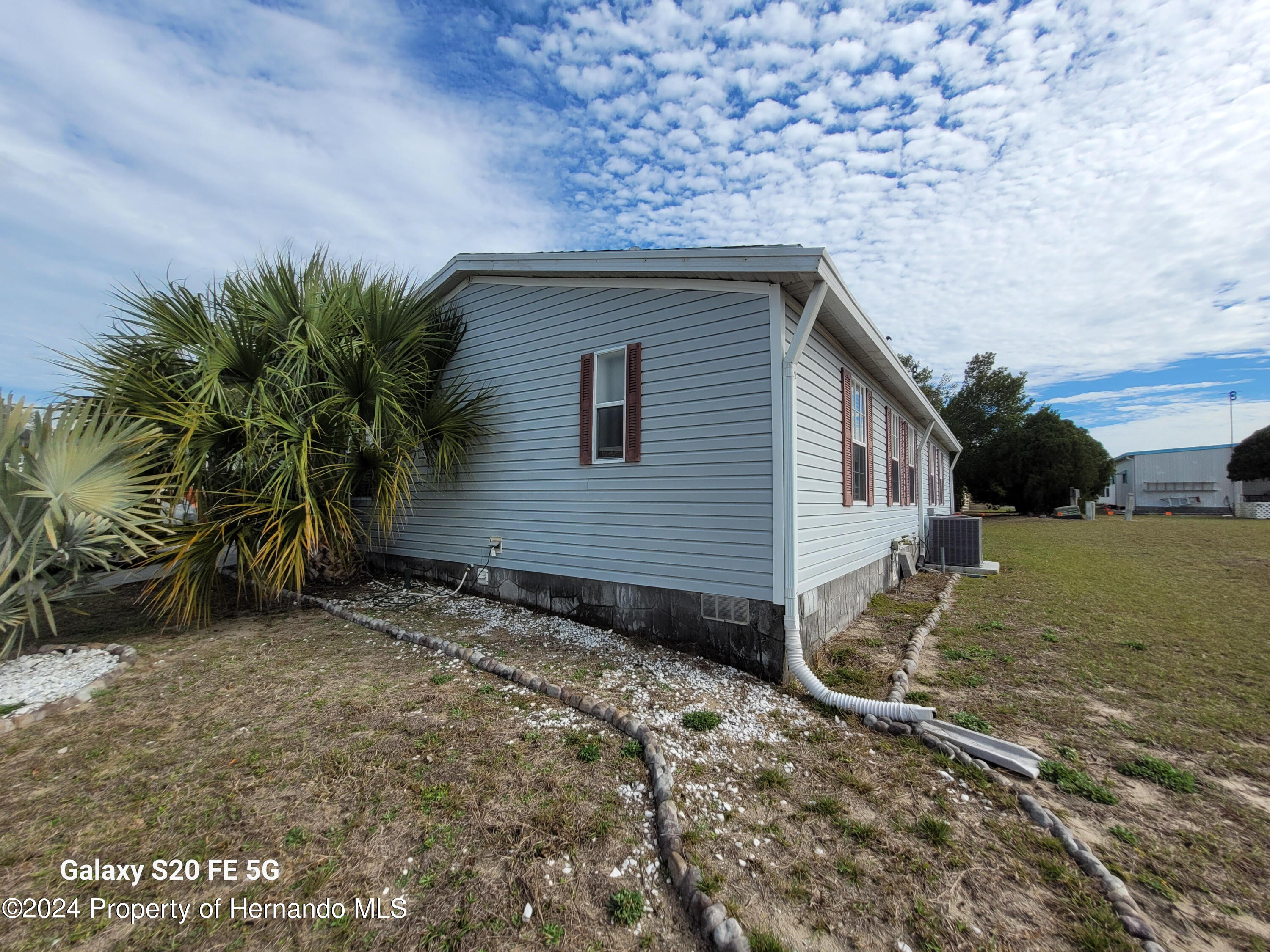 14902 Rialto Avenue Brooksville, FL 34613 - Photo 49 of 55 side angle house