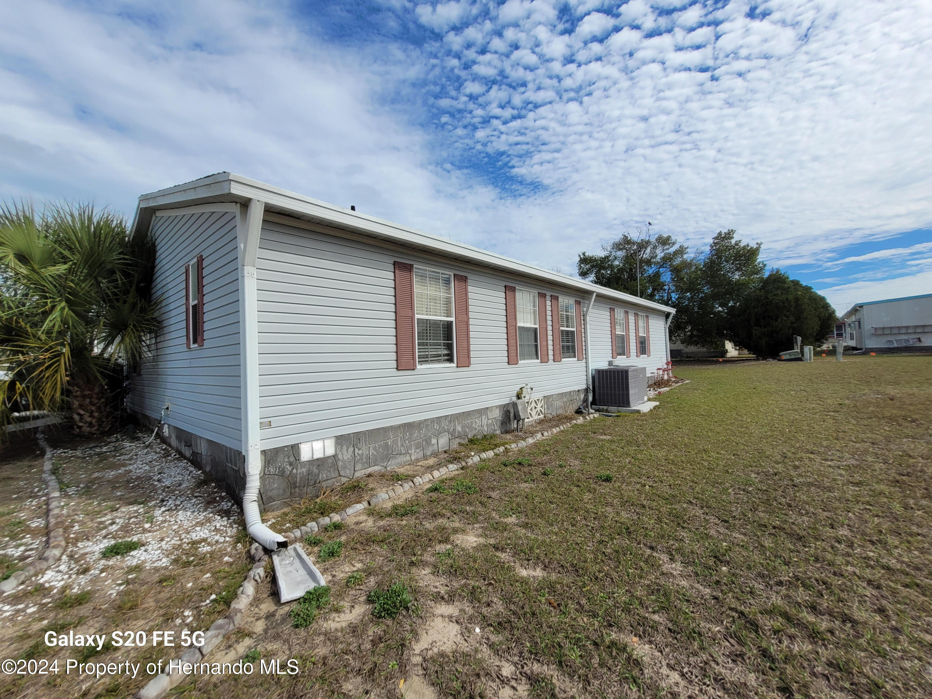 14902 Rialto Avenue Brooksville, FL 34613 - Photo 50 of 55 side home 3