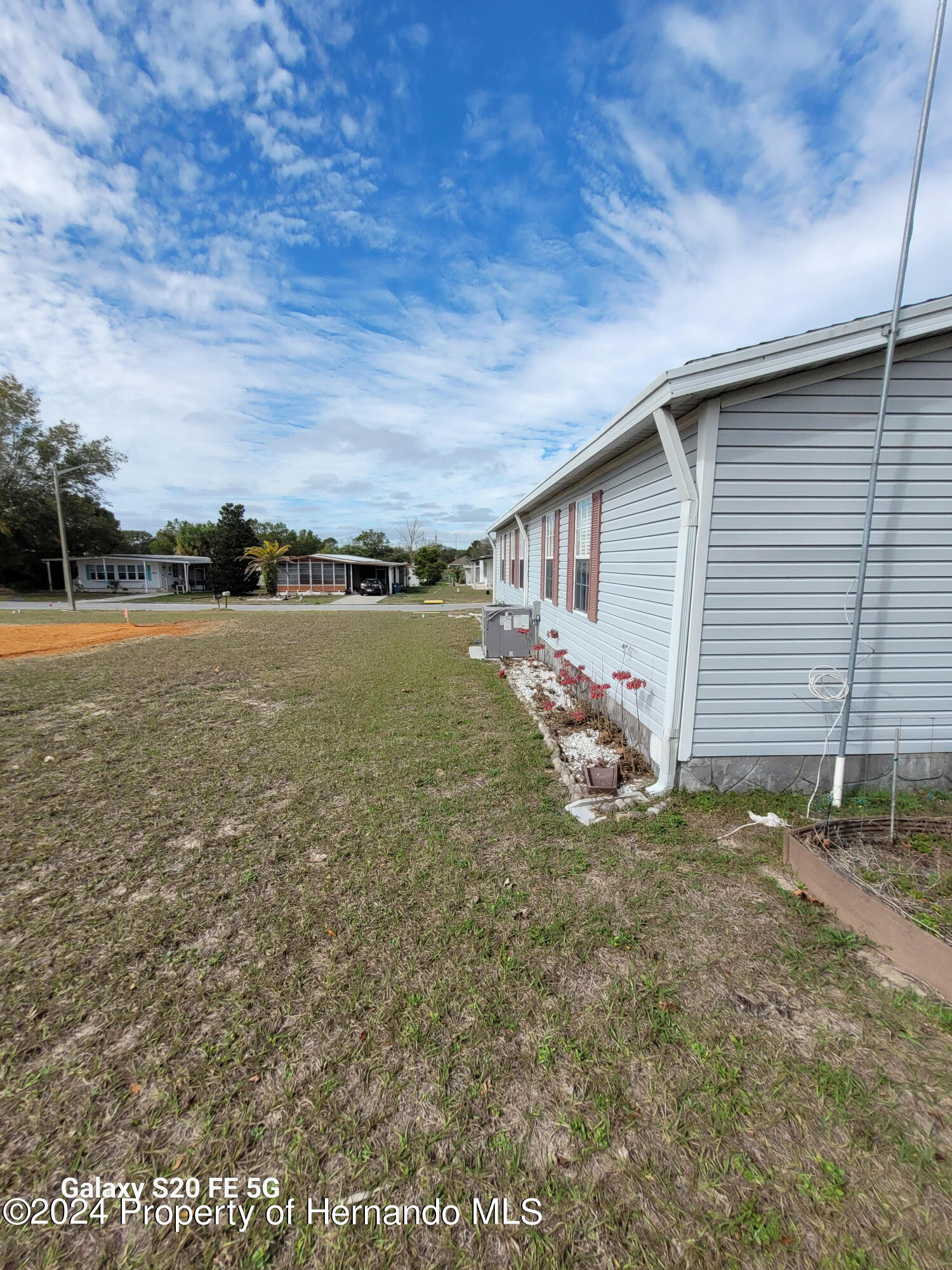 14902 Rialto Avenue Brooksville, FL 34613 - Photo 51 of 55 side homes 2