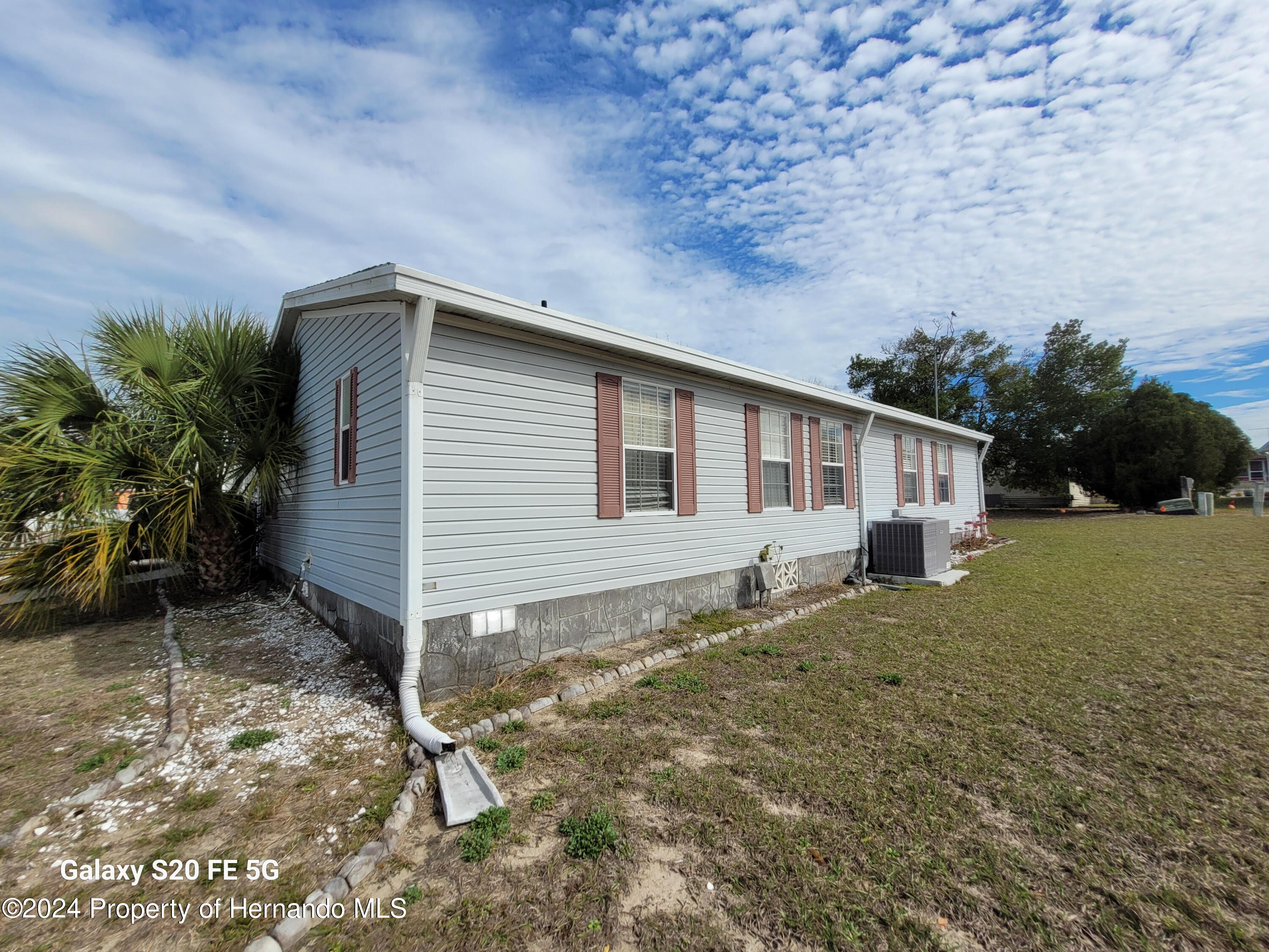 14902 Rialto Avenue Brooksville, FL 34613 - Photo 52 of 55 side of home 3