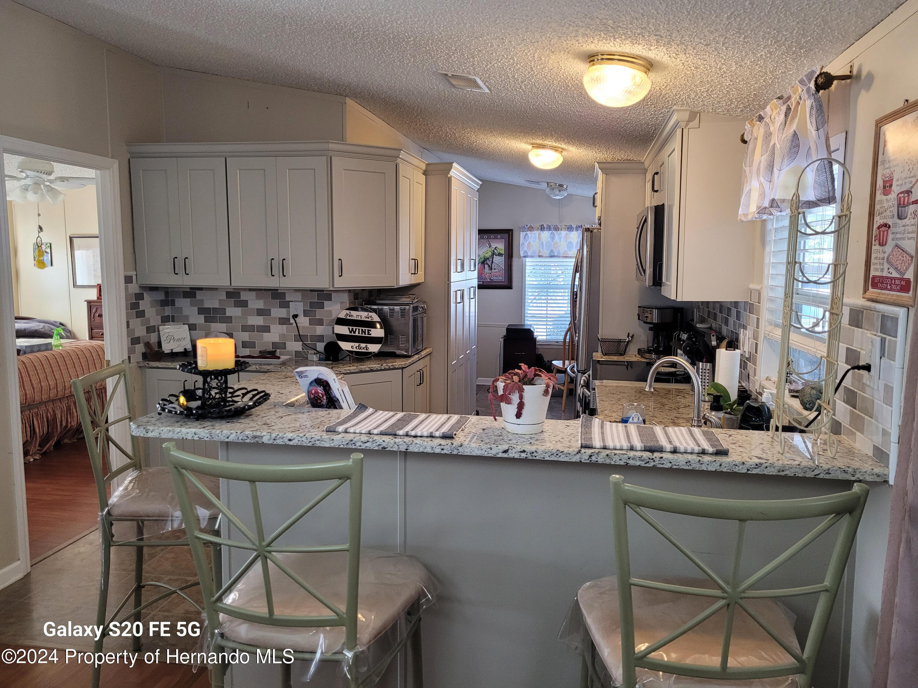 14902 Rialto Avenue Brooksville, FL 34613 - Photo 7 of 55 kitchen 10