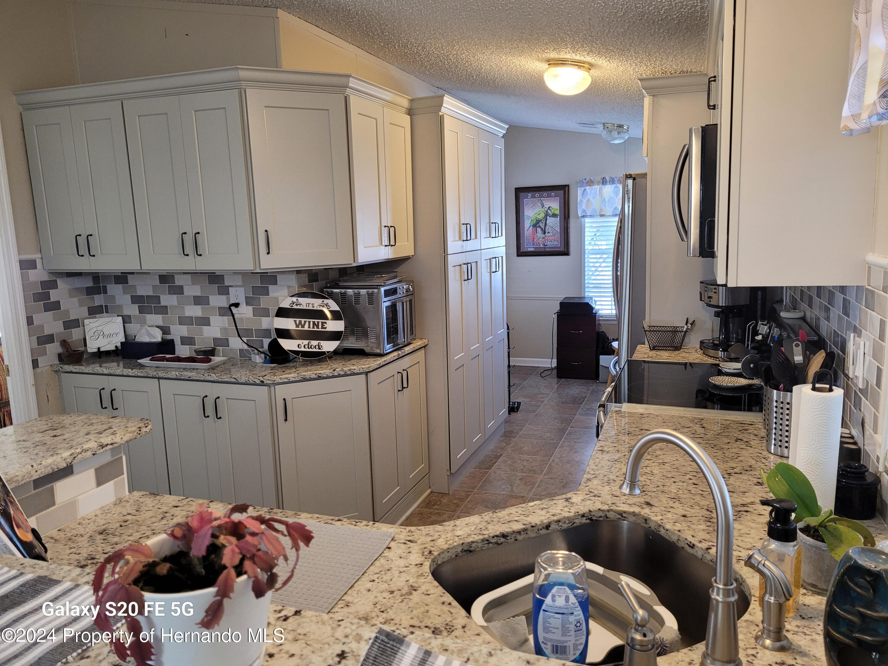 14902 Rialto Avenue Brooksville, FL 34613 - Photo 8 of 55 kitchen 13