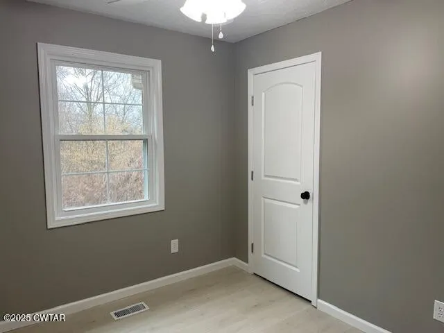 an empty room with a window