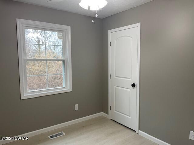 157 Doster Road McKenzie, TN 38201 - Photo 16 of 23 an empty room with windows and closet