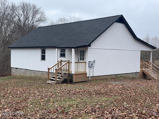 157 Doster Road McKenzie, TN 38201 - Photo 2 of 23 a backyard of a house with table and chairs