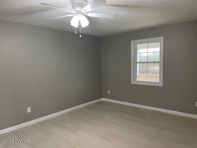 157 Doster Road McKenzie, TN 38201 - Photo 21 of 23 an empty room with a window and a fan