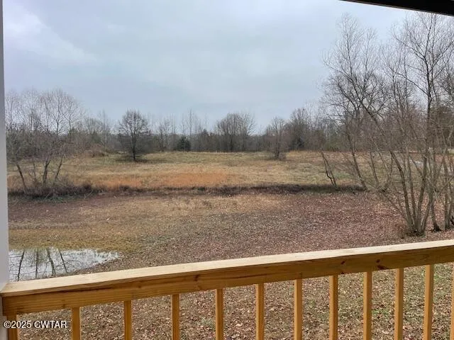 a view of a lake from a yard