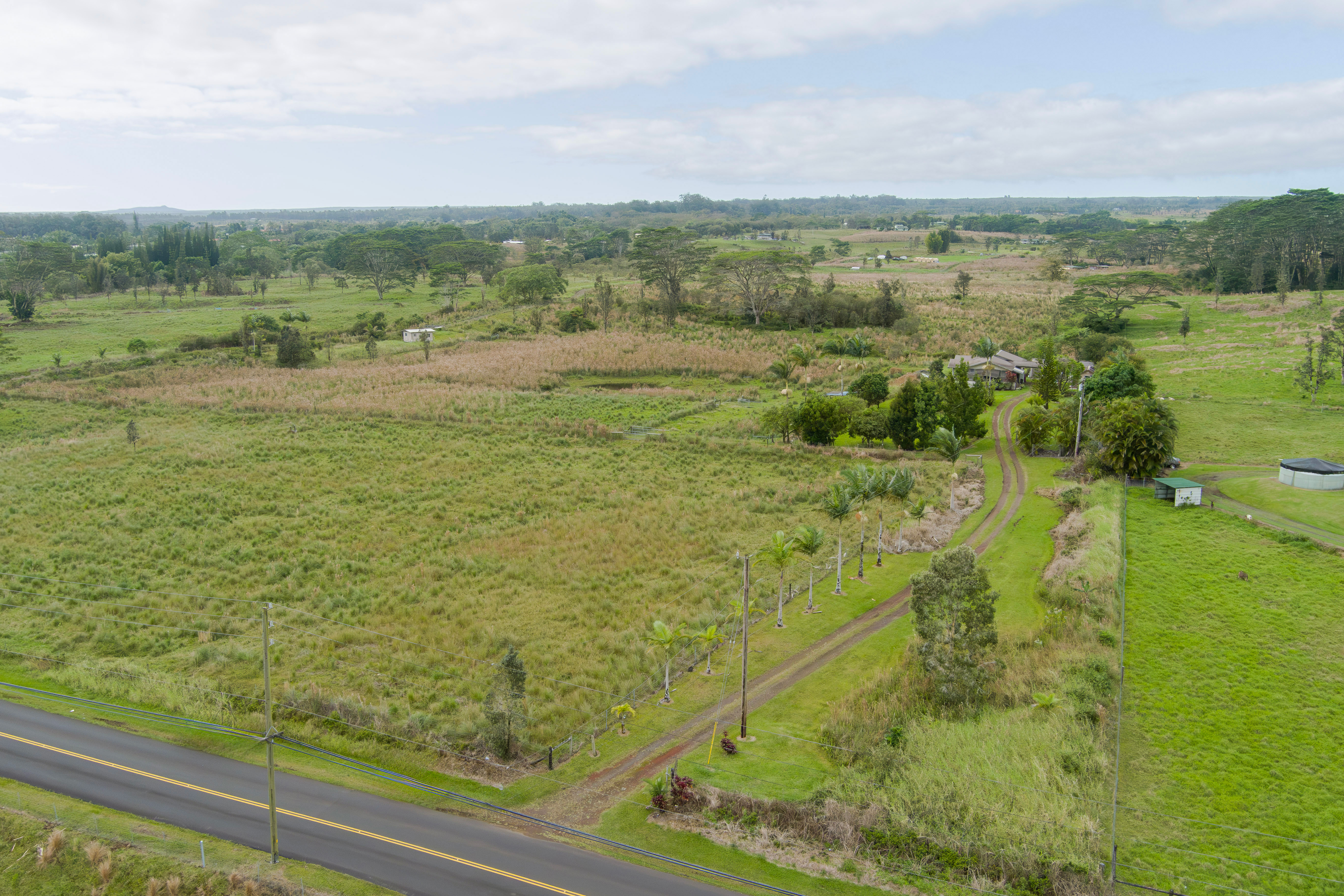 18-7747 North Kulani Road Mountain View, HI 96771 - Photo 11 of 28 a view of an outdoor space and a lake view